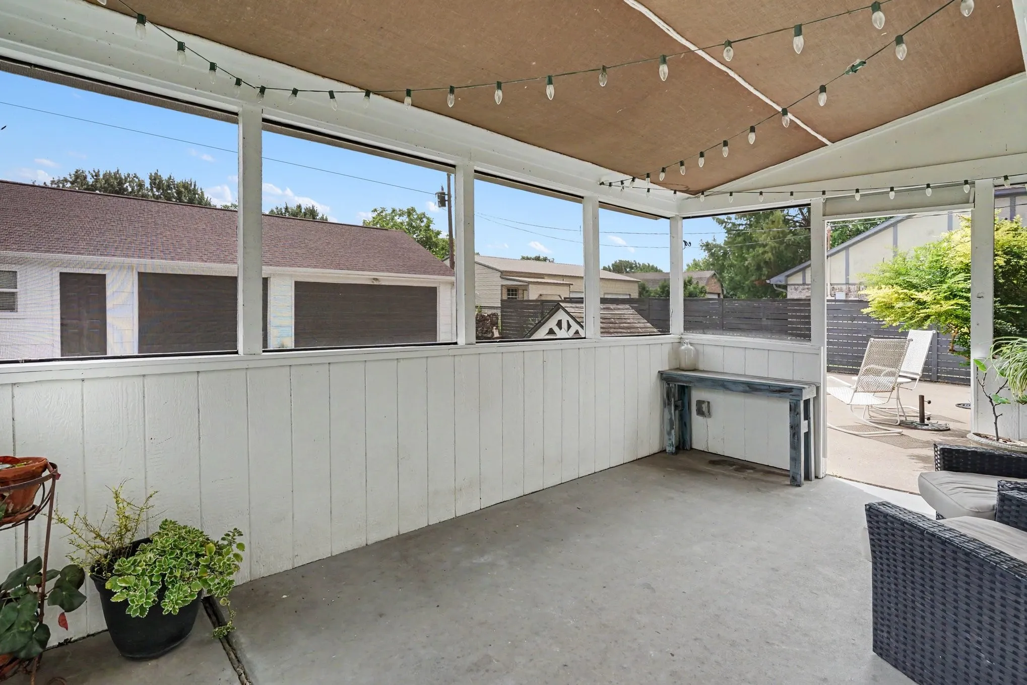 Open air, screened porch off of the kitchen.