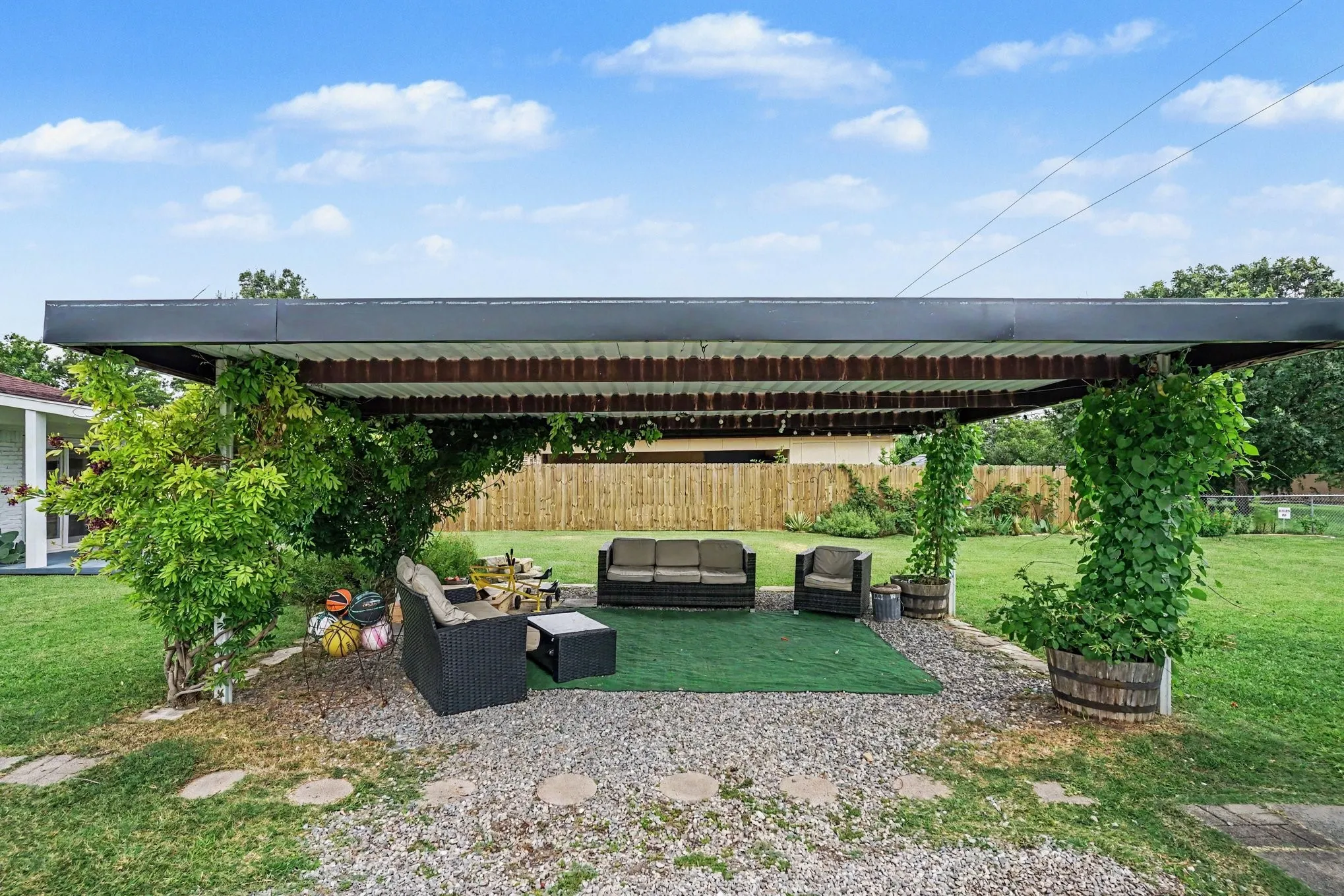 Covered carport or outdoor sitting area