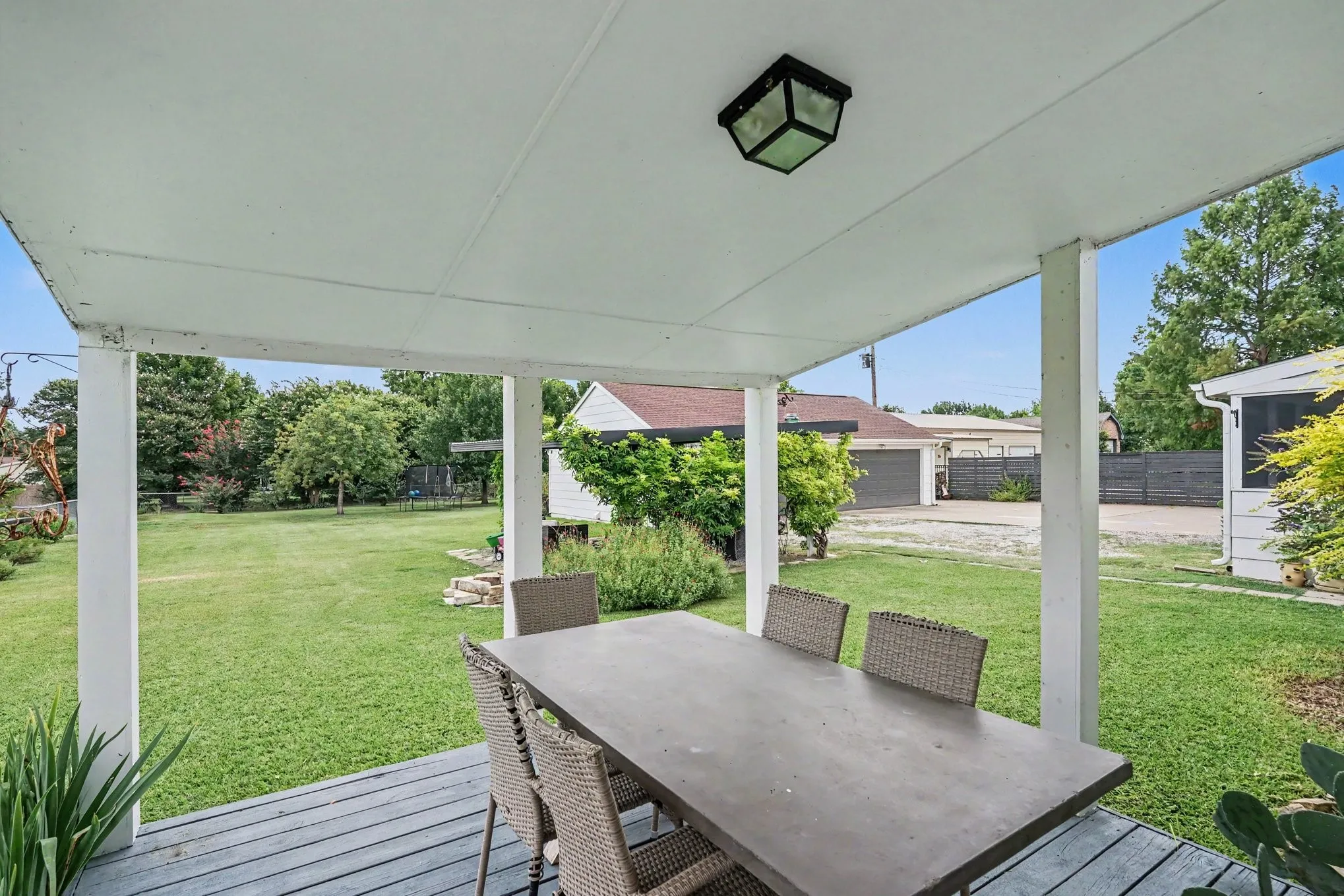Wonderful covered deck off of the Primary bedroom - lovely quiet space for morning coffee, breakfast or dinner al fresco or just a spot to watch and listen to nature