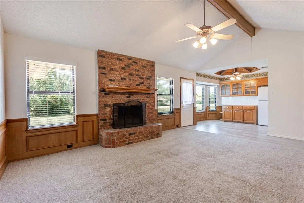 Bay windows and built in cabinetry for this cozy eat in space