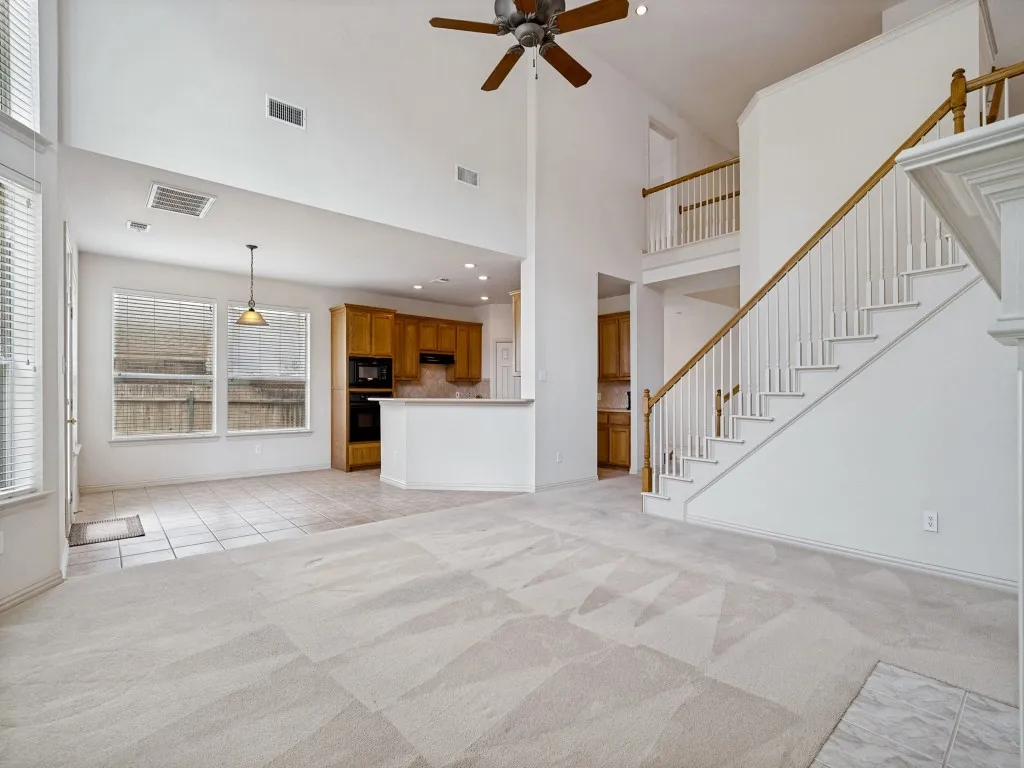 View of living room, breakfast area, kitchen
