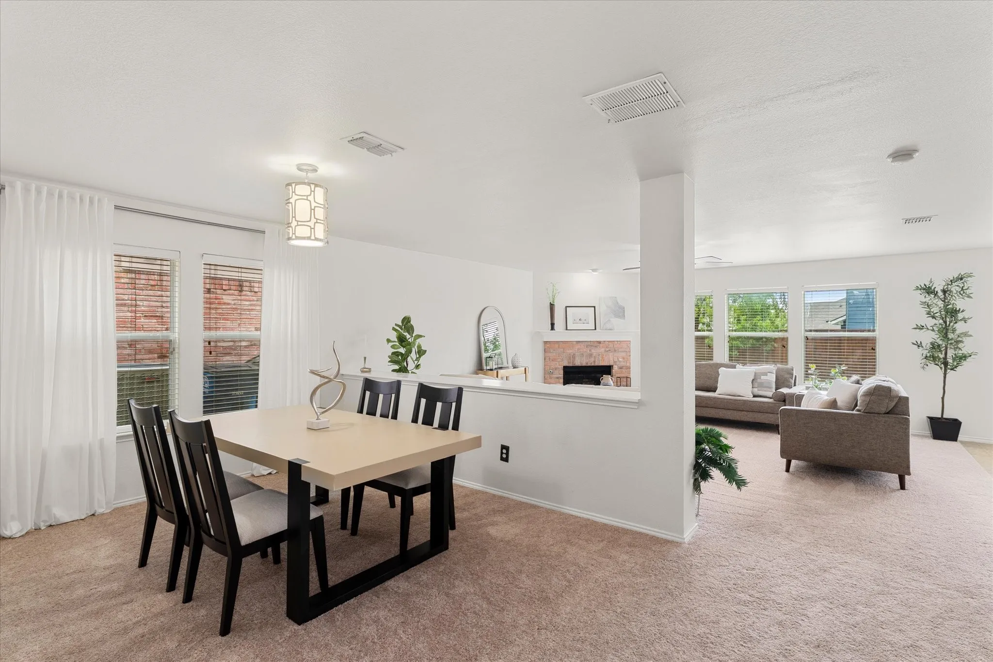 Imaging a home designed for seamless gatherings, where every corner invites connection and warmth.  This property features an open-concept layout that effortlessly integrates the living, dining and kitchen areas, ensuring you're never far from your loved ones.