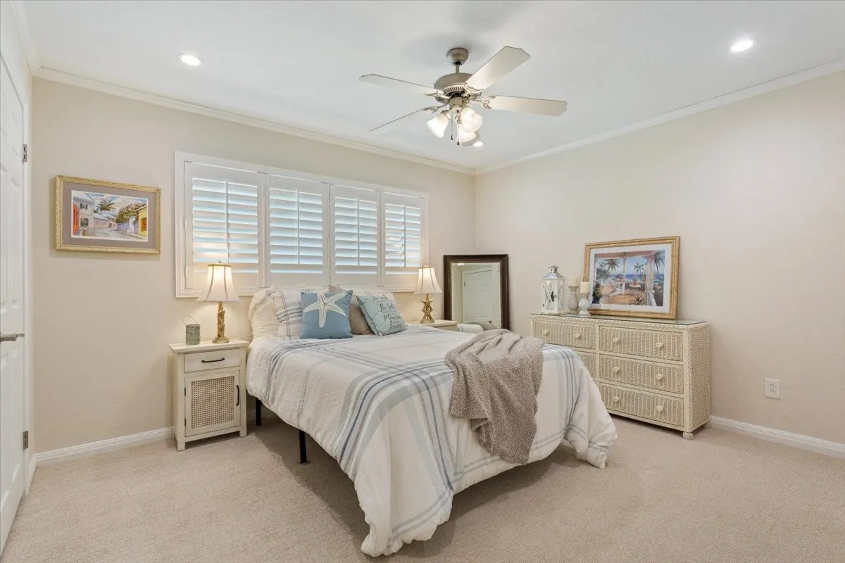 Room with neutral wall color and crown molding
