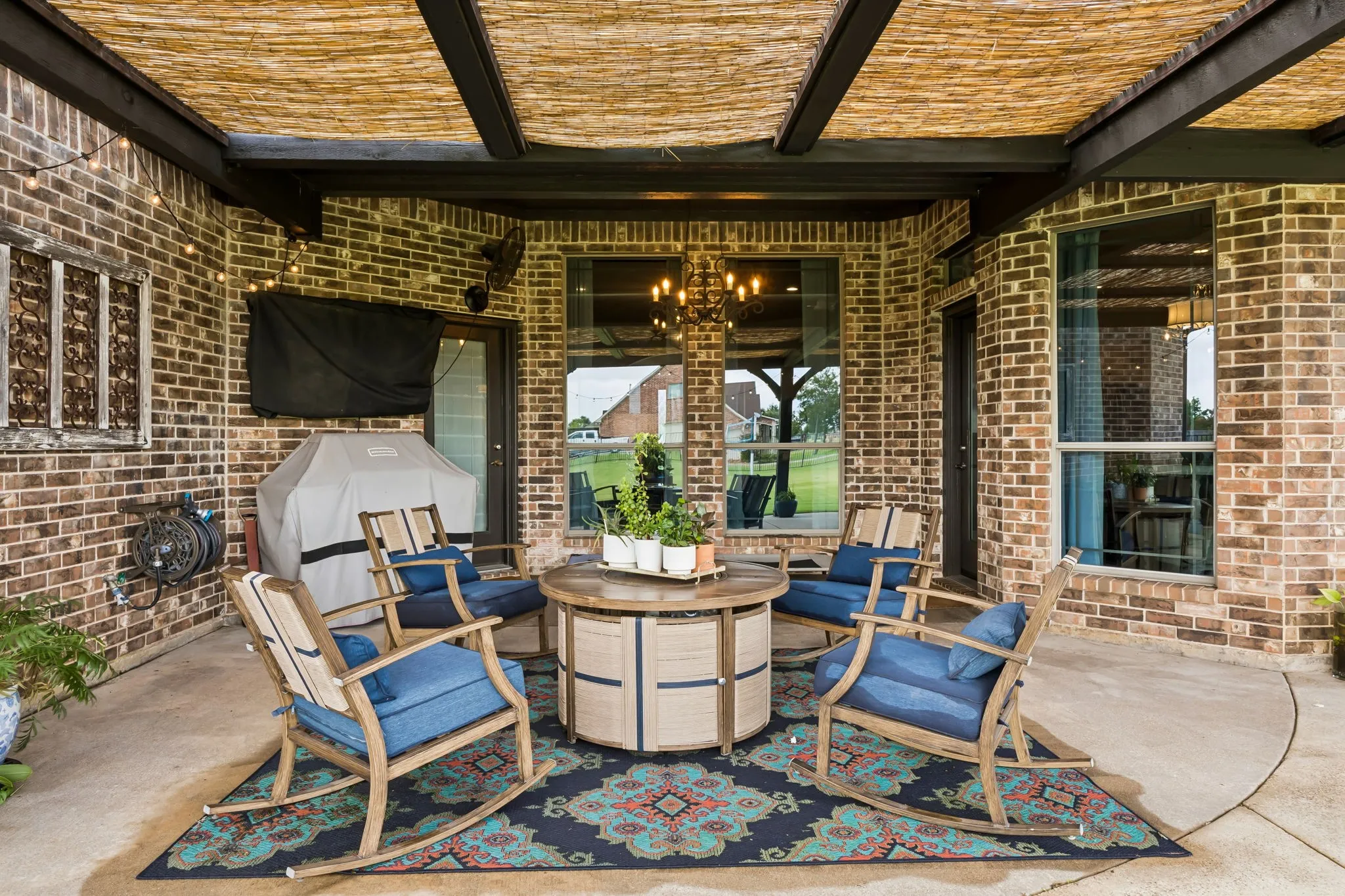 The covered patio is the perfect spot to relax