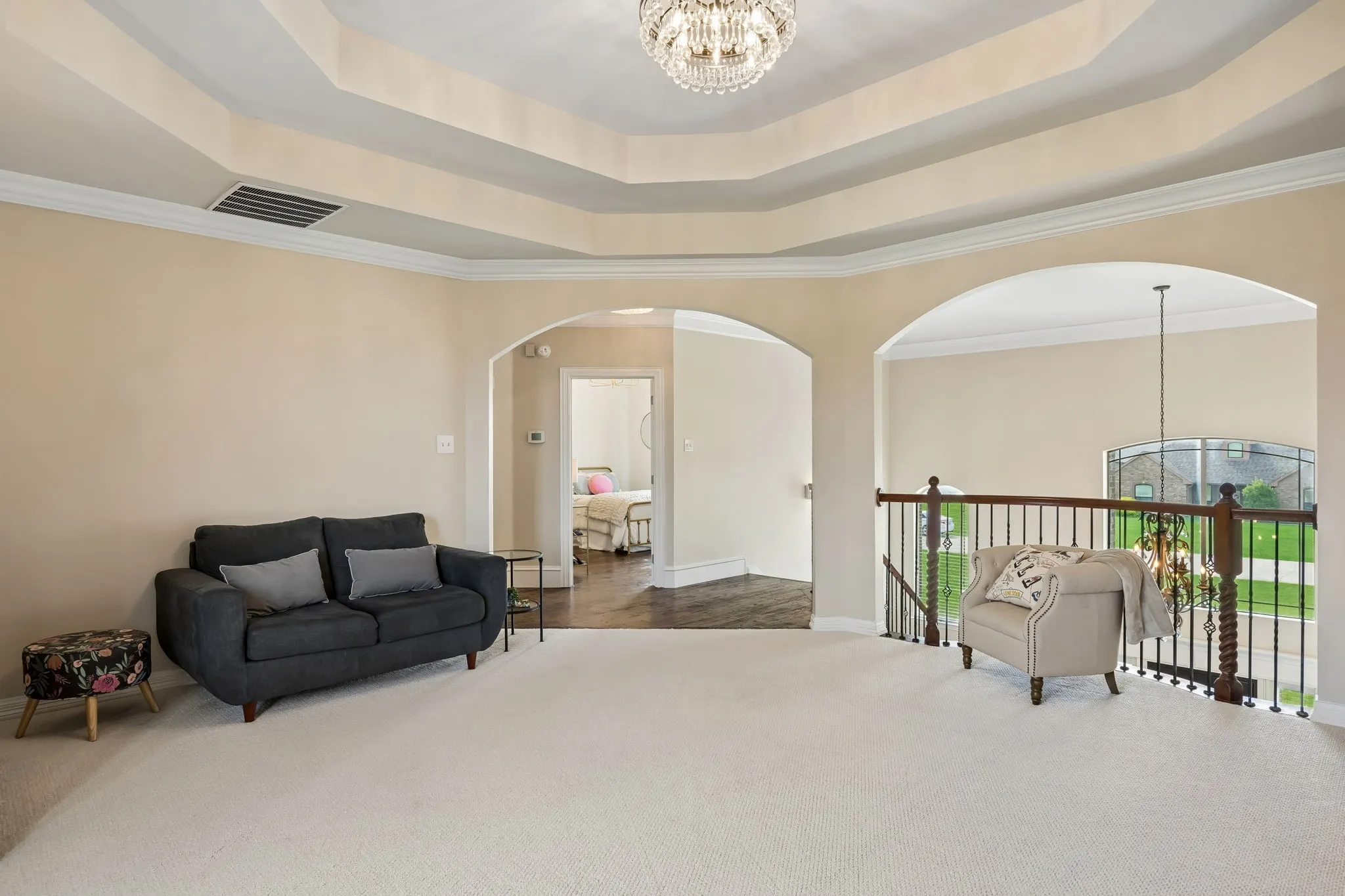 Here you can see the landing and the arched openings to the downstairs.