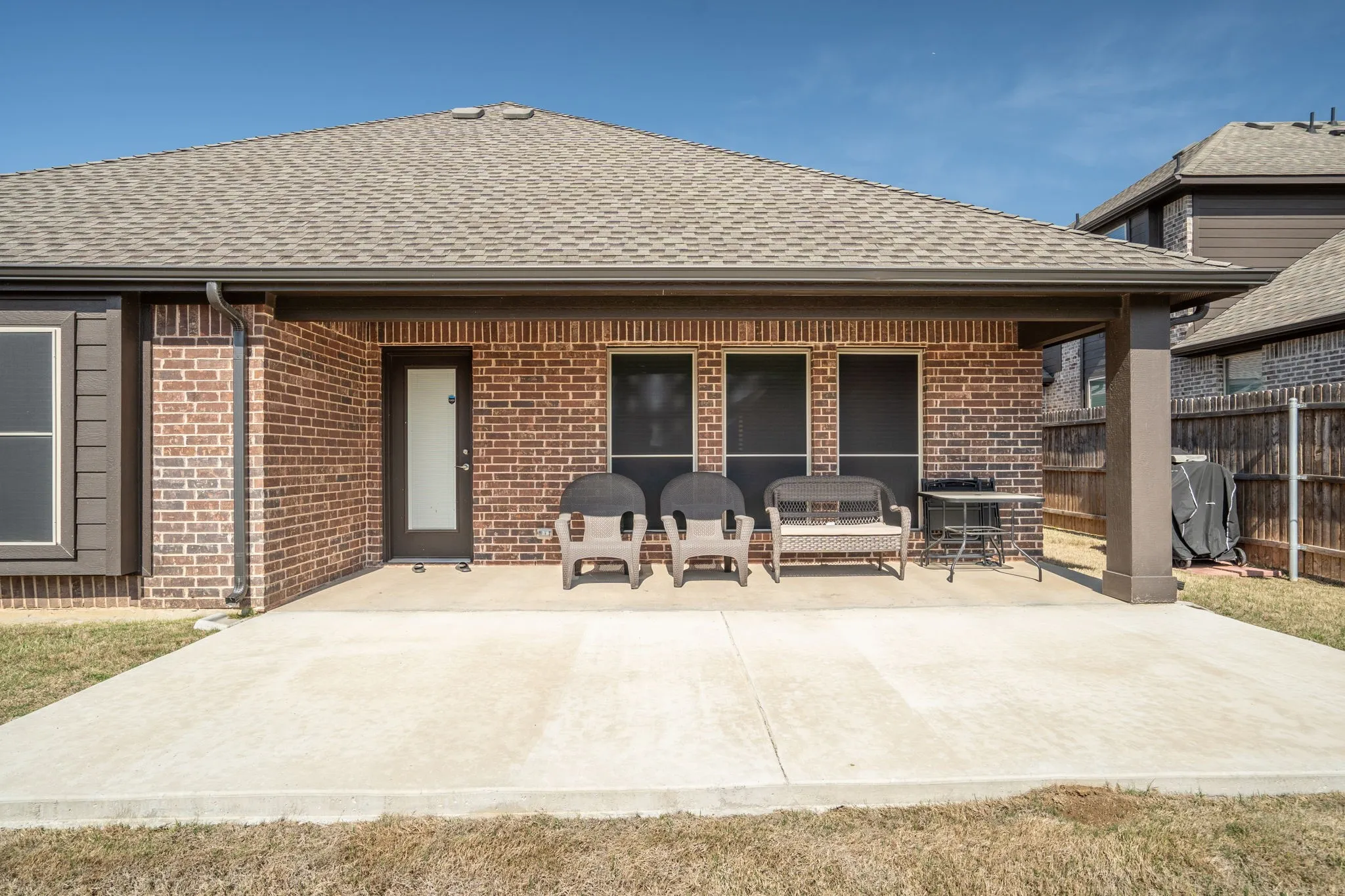The backyard features a partially-covered, extended patio - the perfect place to relax or entertain.