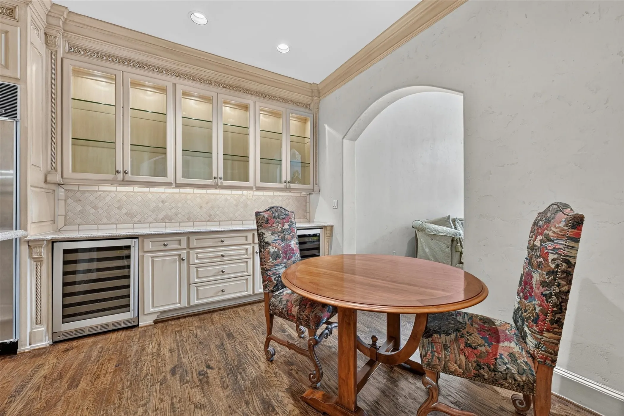 Breakfast Area has a large Bar area with abundant storage & 2 wine coolers.