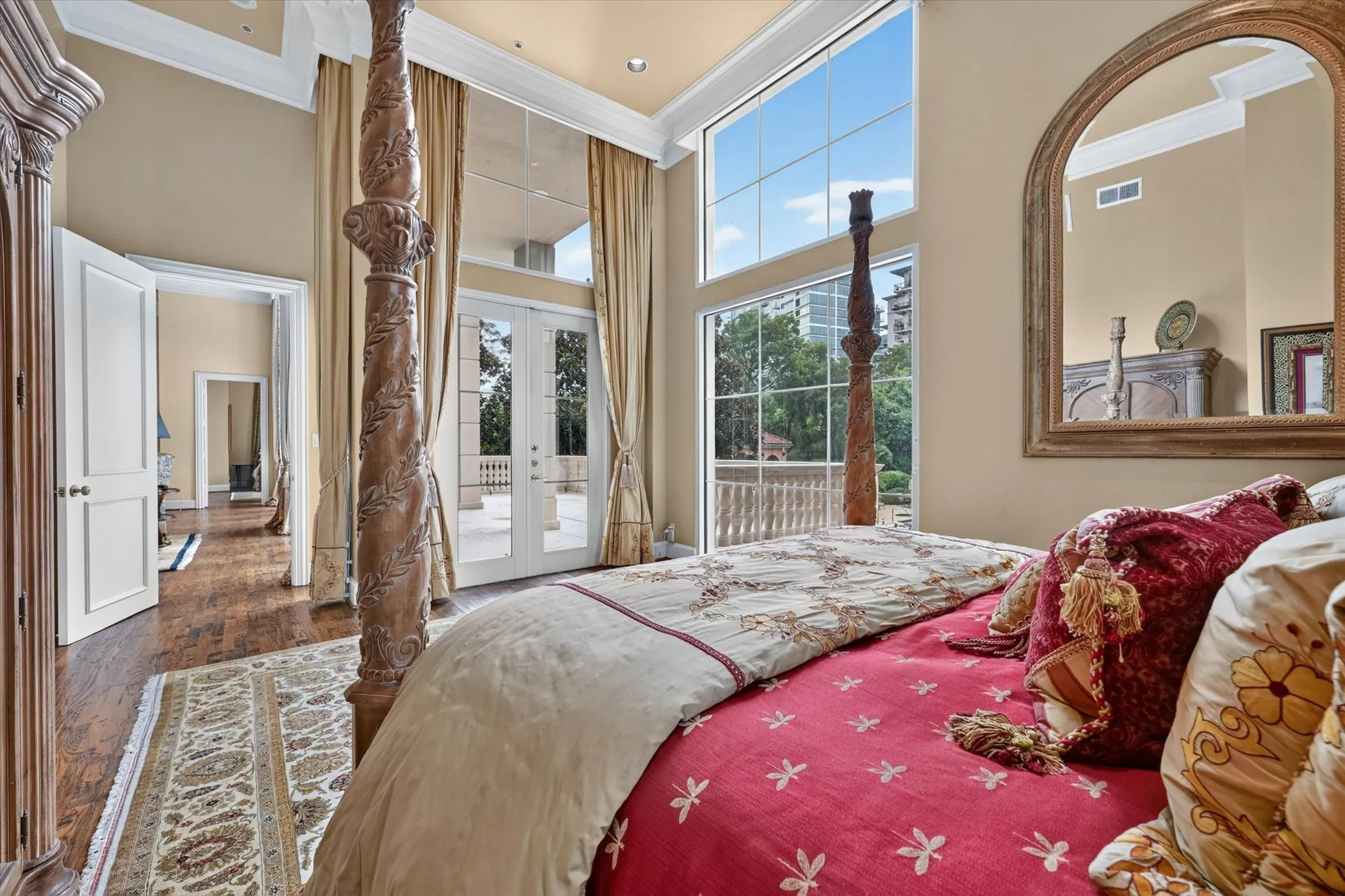 Split Secondary Primary Bedroom has French doors to Balcony.