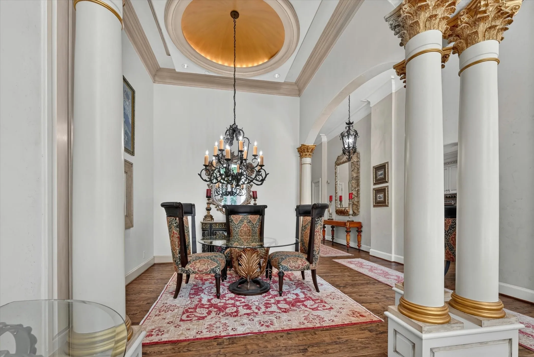 Gracious Dining Room is set apart by columns.