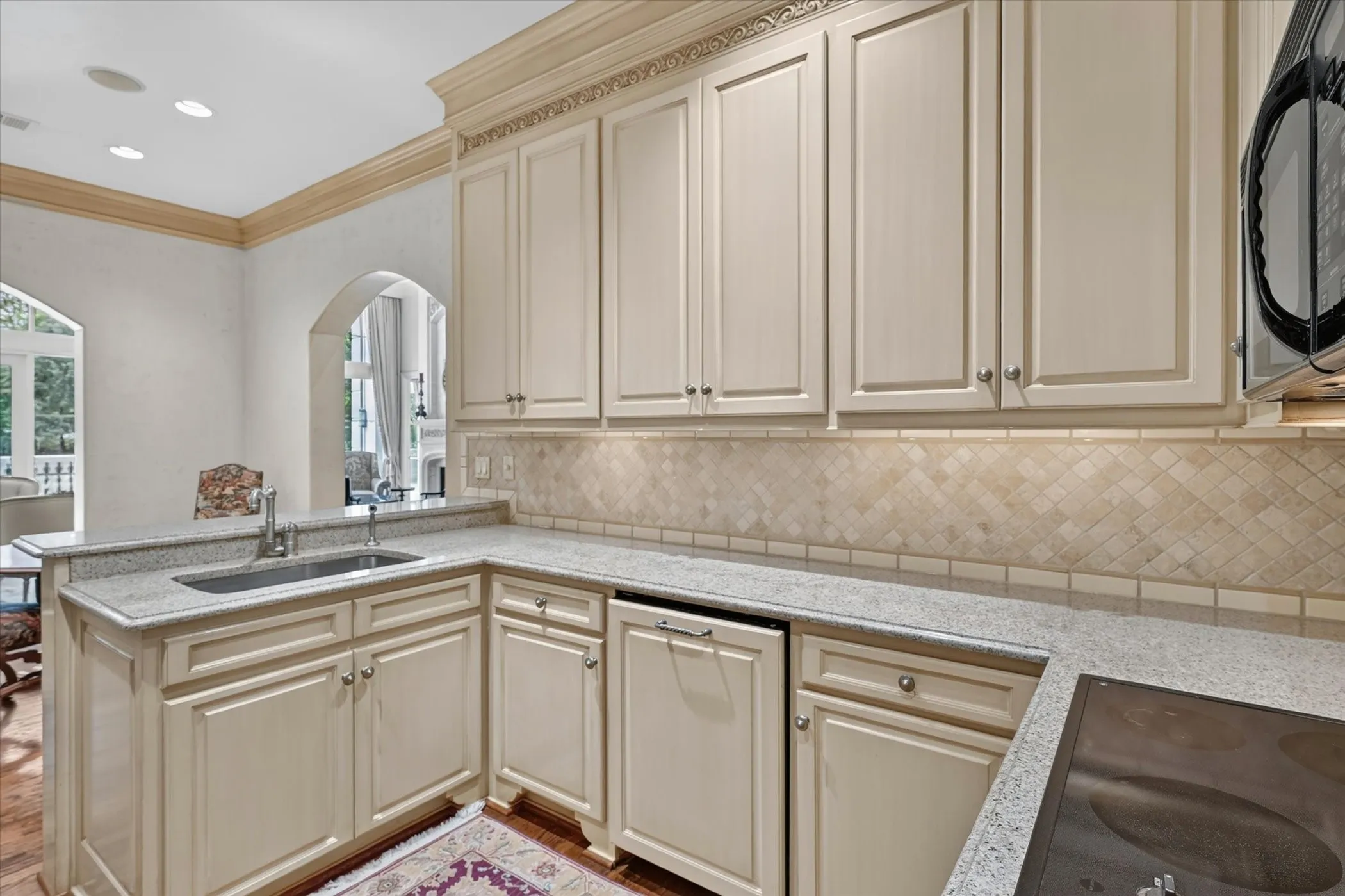 Kitchen overlooks the Breakfast area.