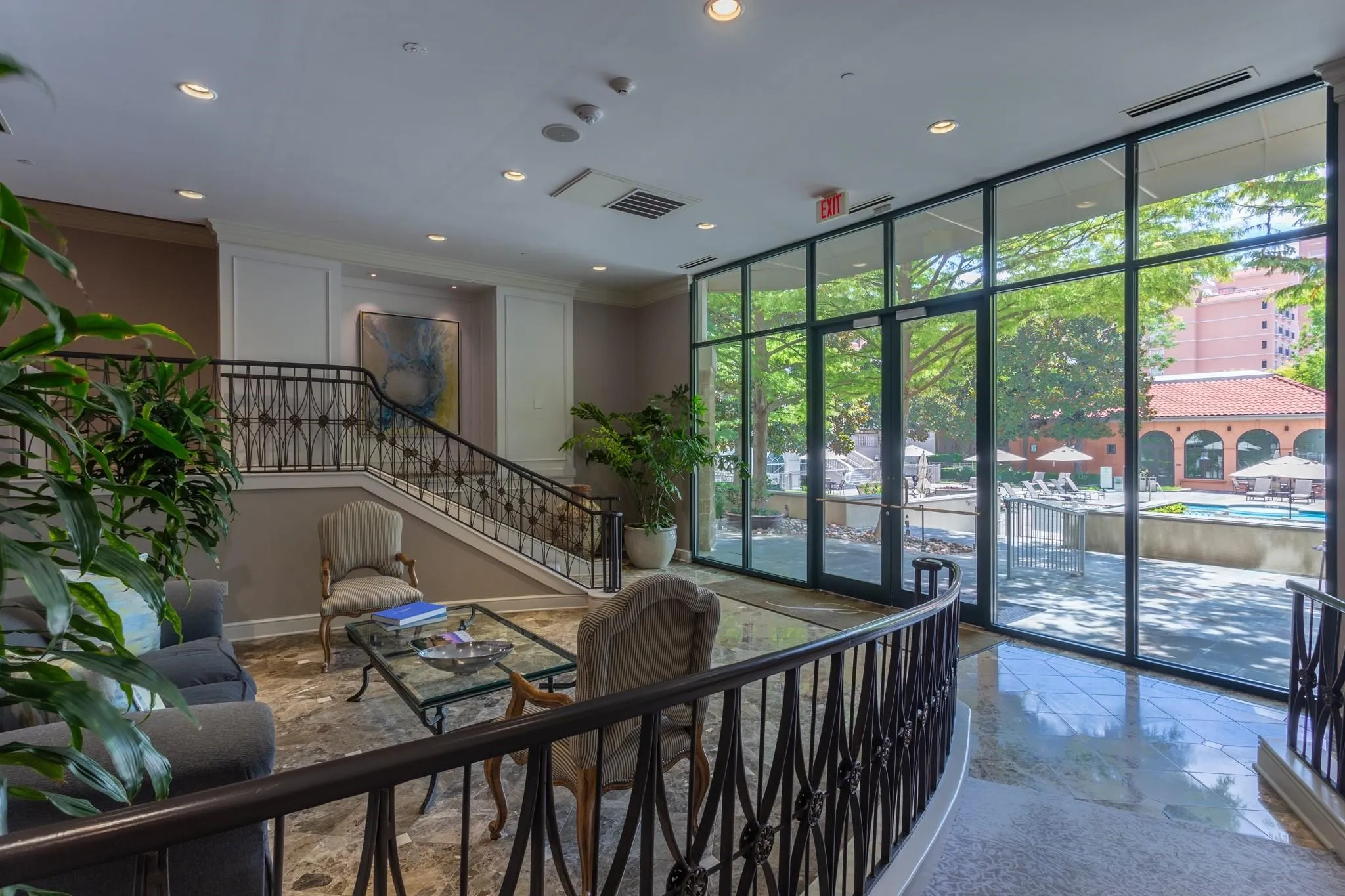 Sitting area off pool and fitness center.