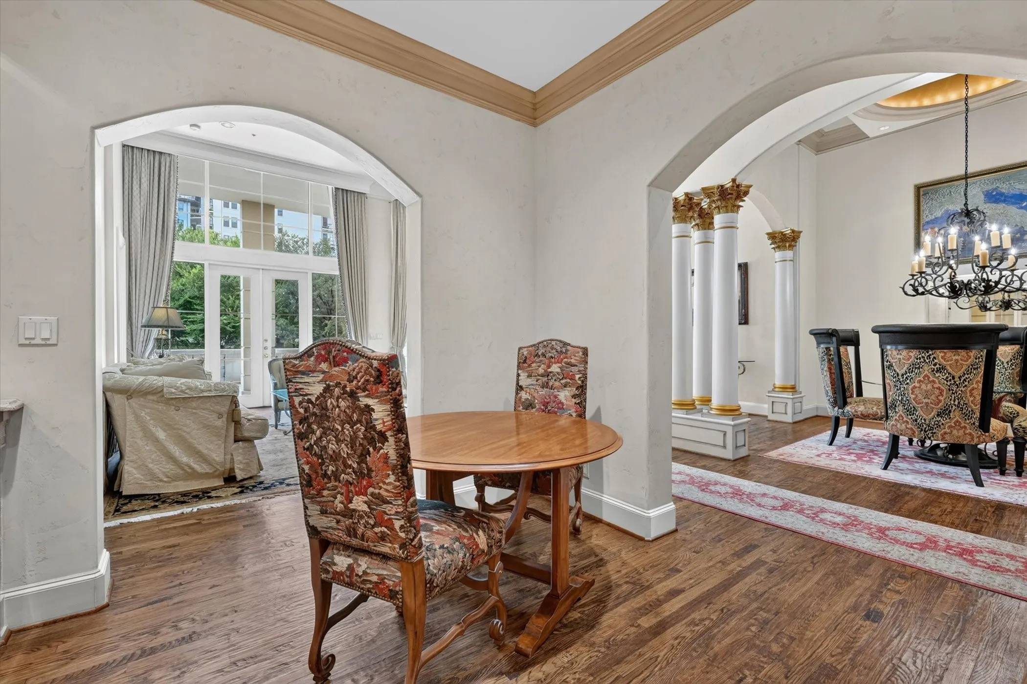 Kitchen/Breakfast open to Dining & Living through archways.