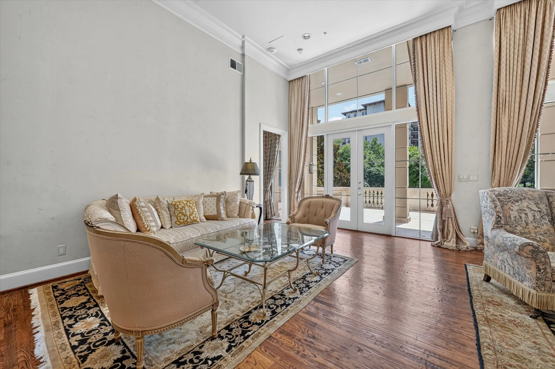 Both Living areas open to the Balcony through French doors.