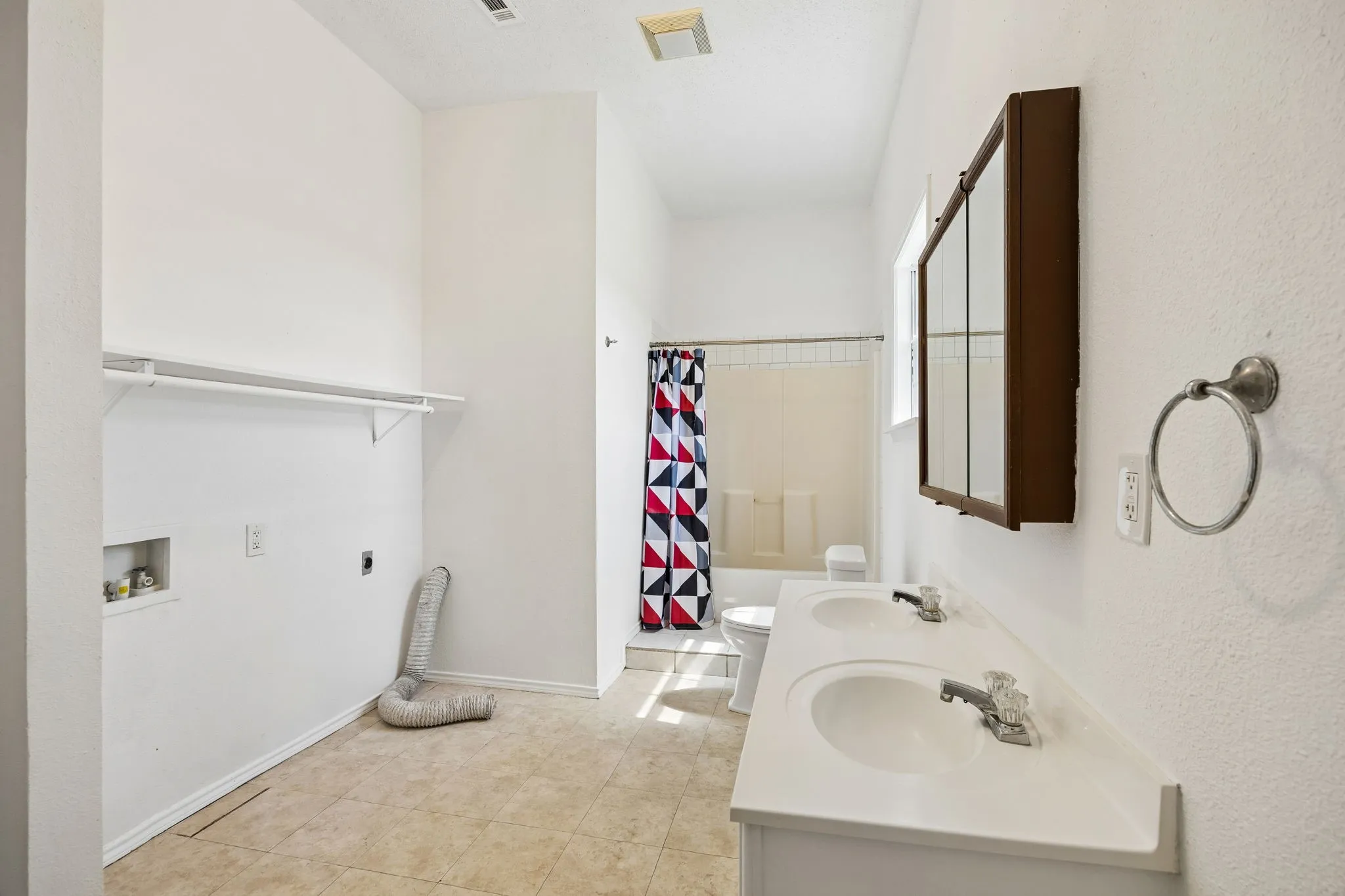Full size washer and dryer connections in Bathroom