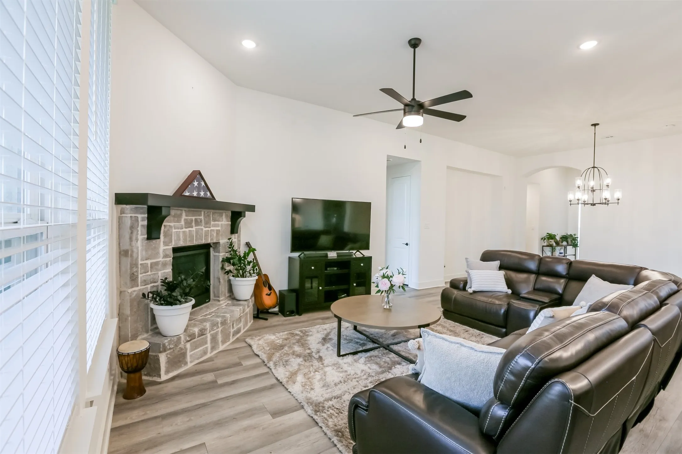 Additional view of living area with gas fireplace