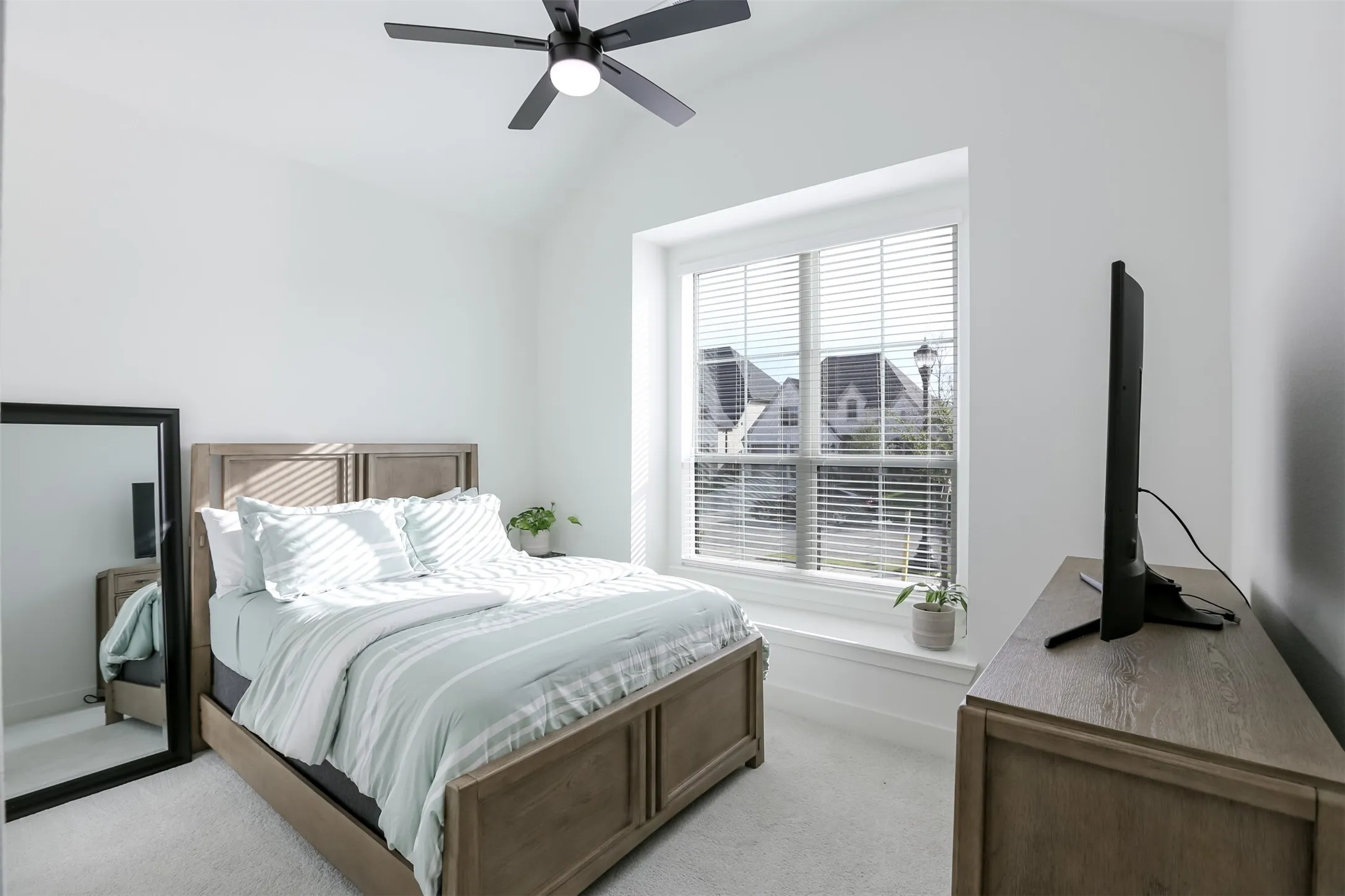 Bedroom located in front of the home