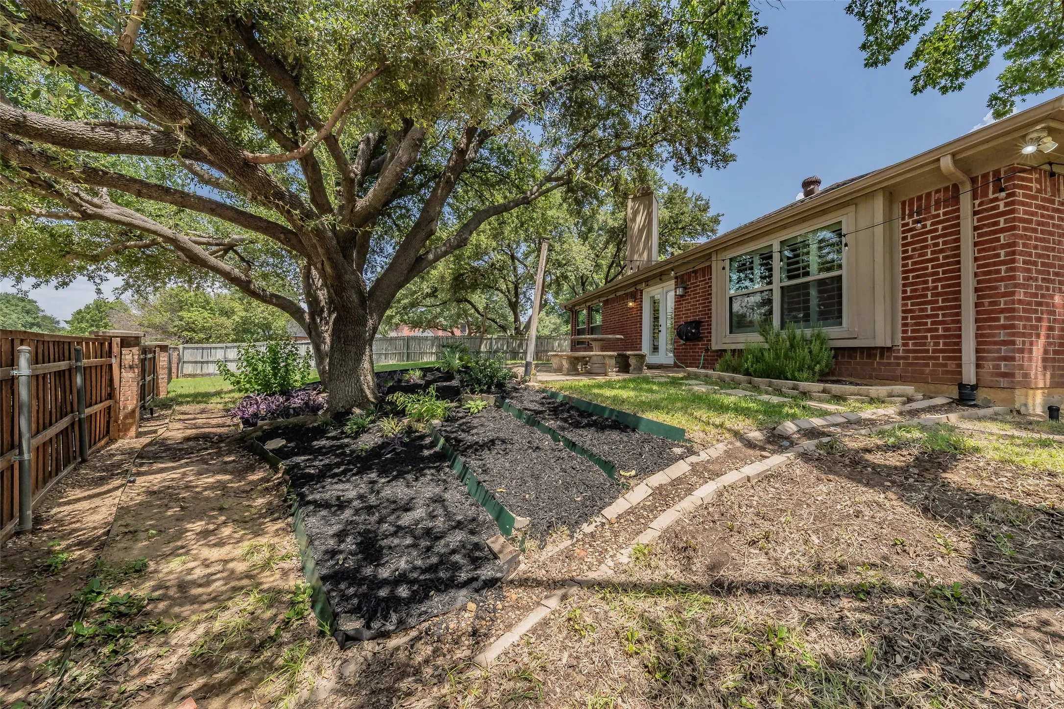 Backyard with plenty of shade trees