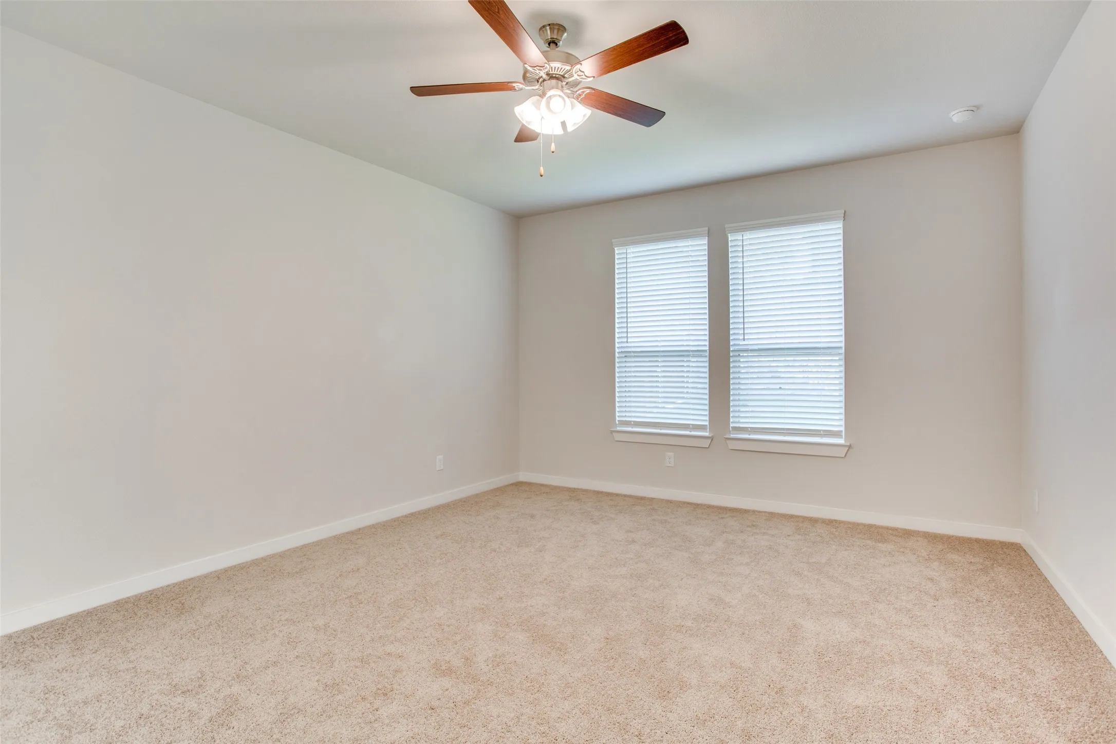Lovely master suite with back yard view