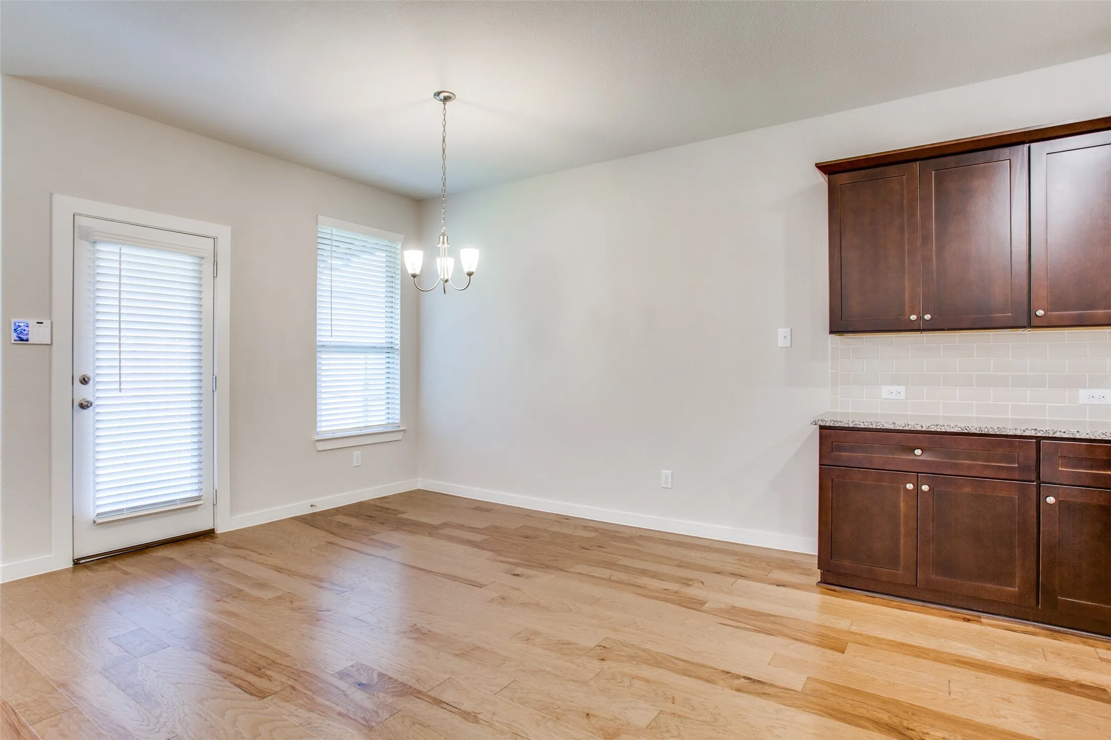 Dining area with door to the covered patio