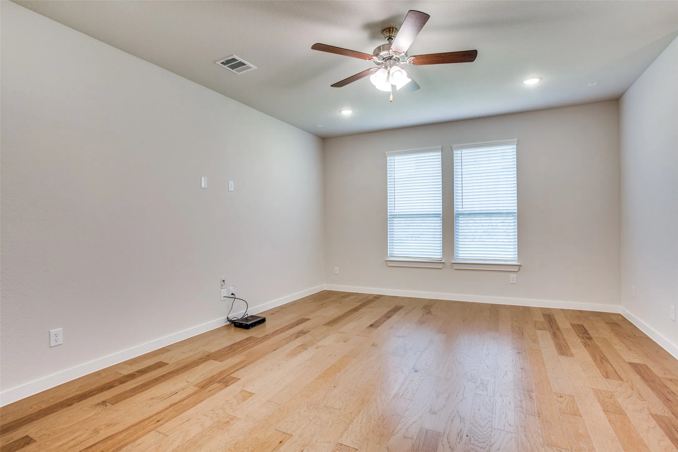 Spacious living room overlooks back yard