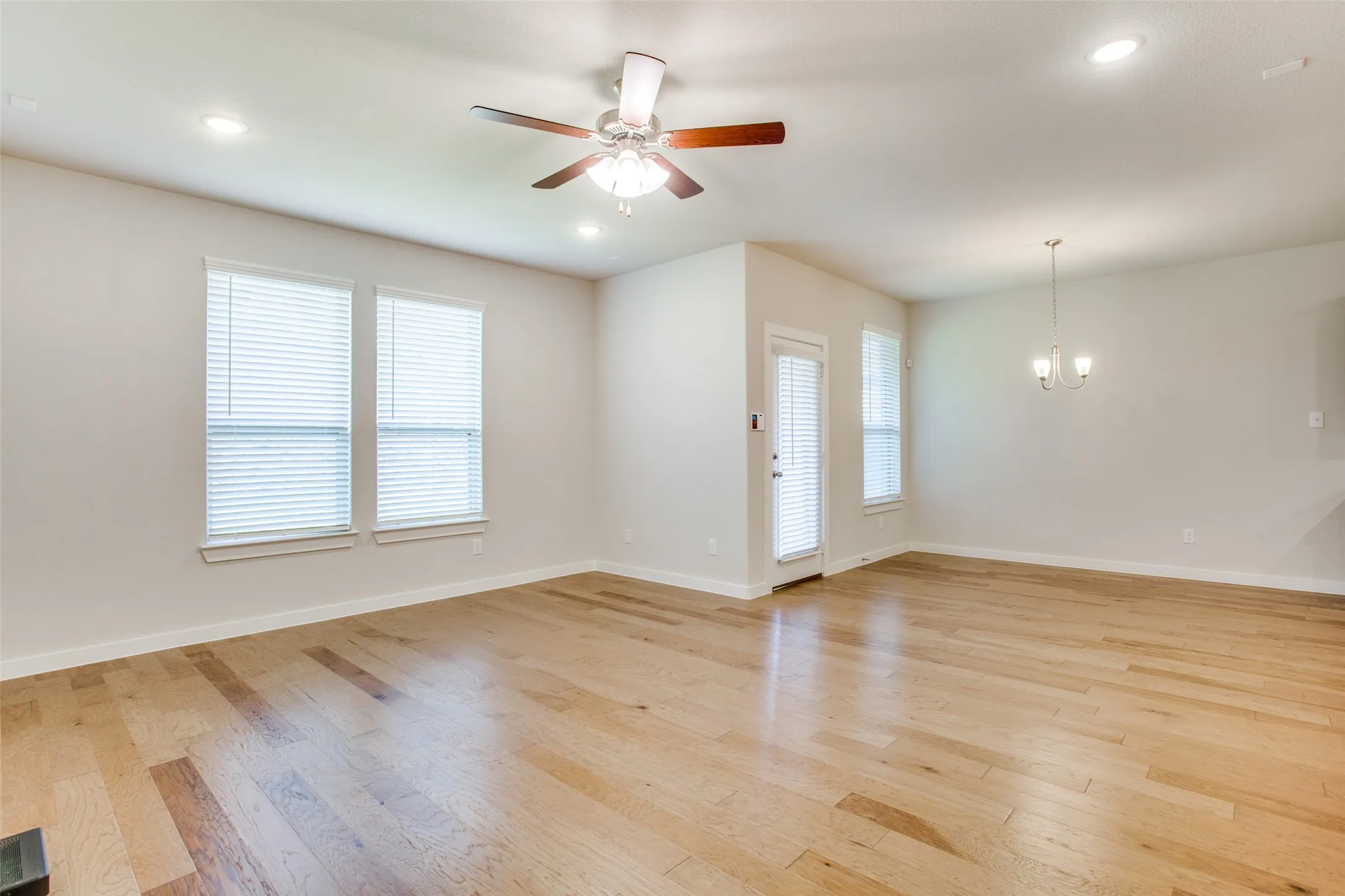 Open living, dining, and kitchen floor plan