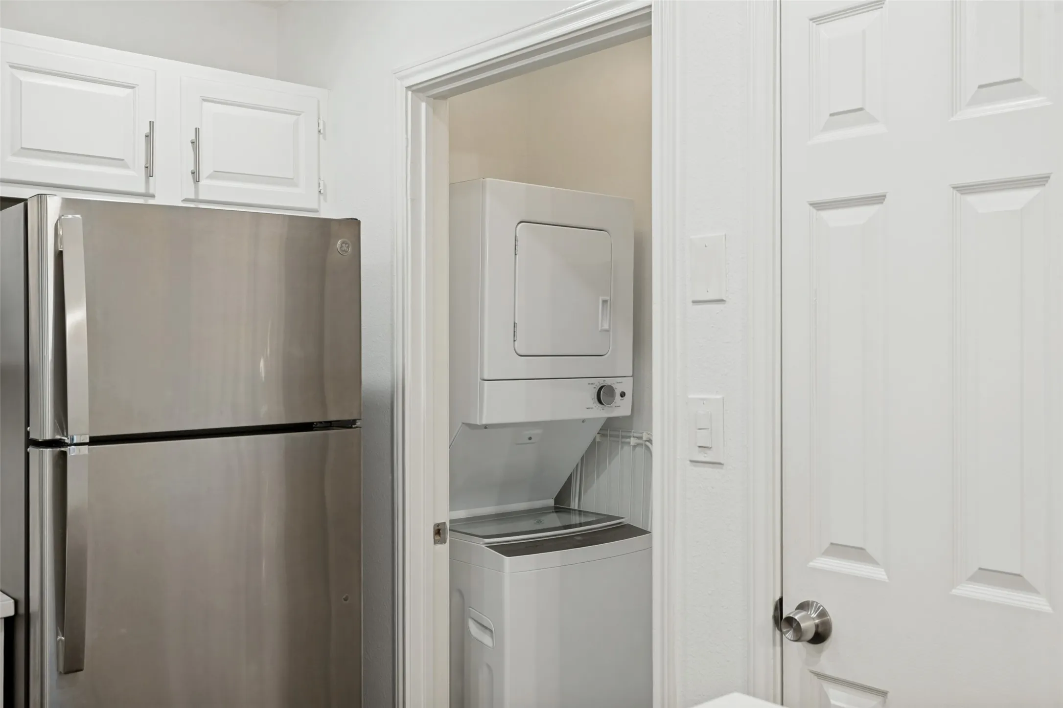 Laundry room with stackable washer/dryer