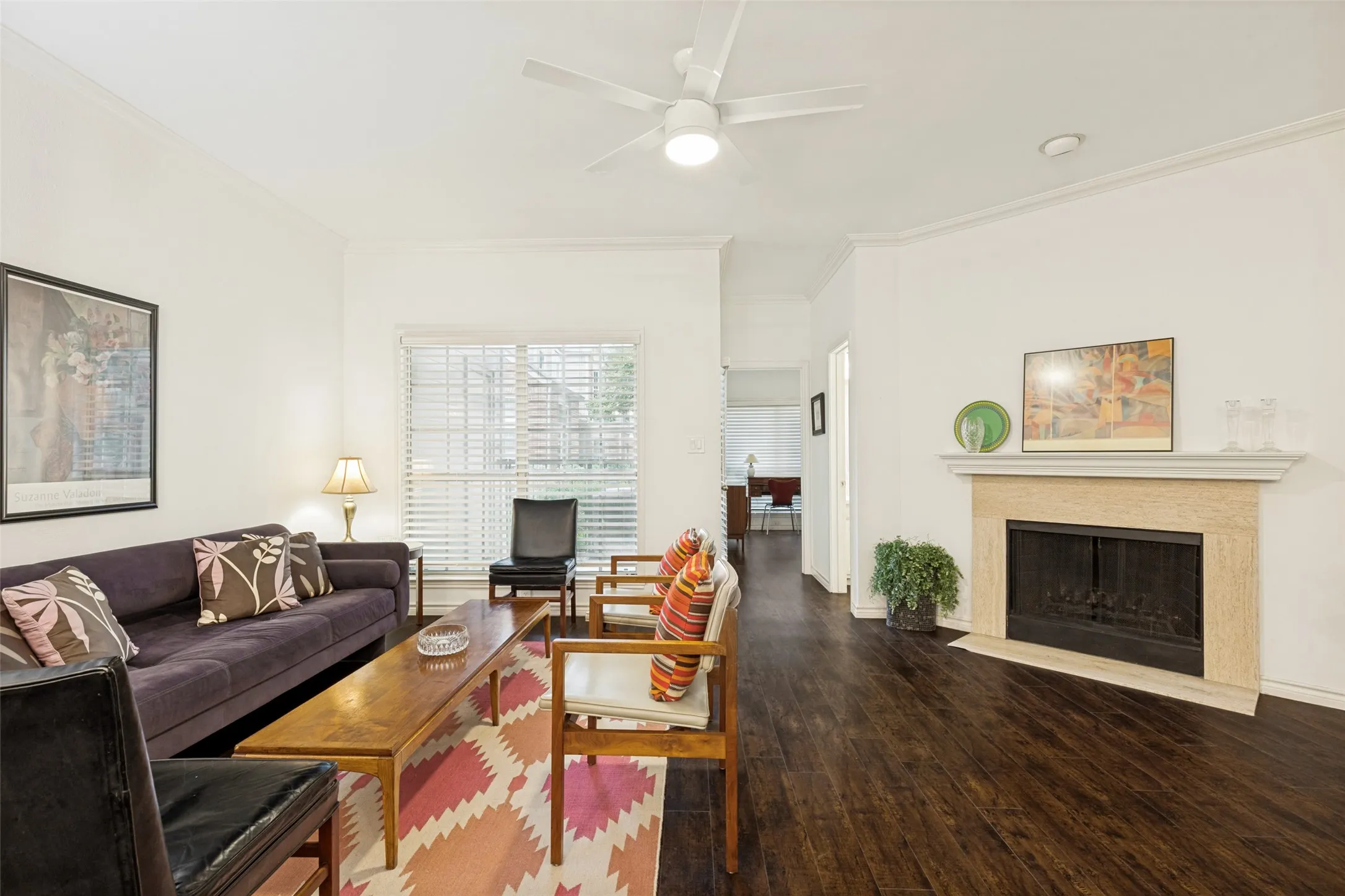 Another view of the living area with the fireplace
