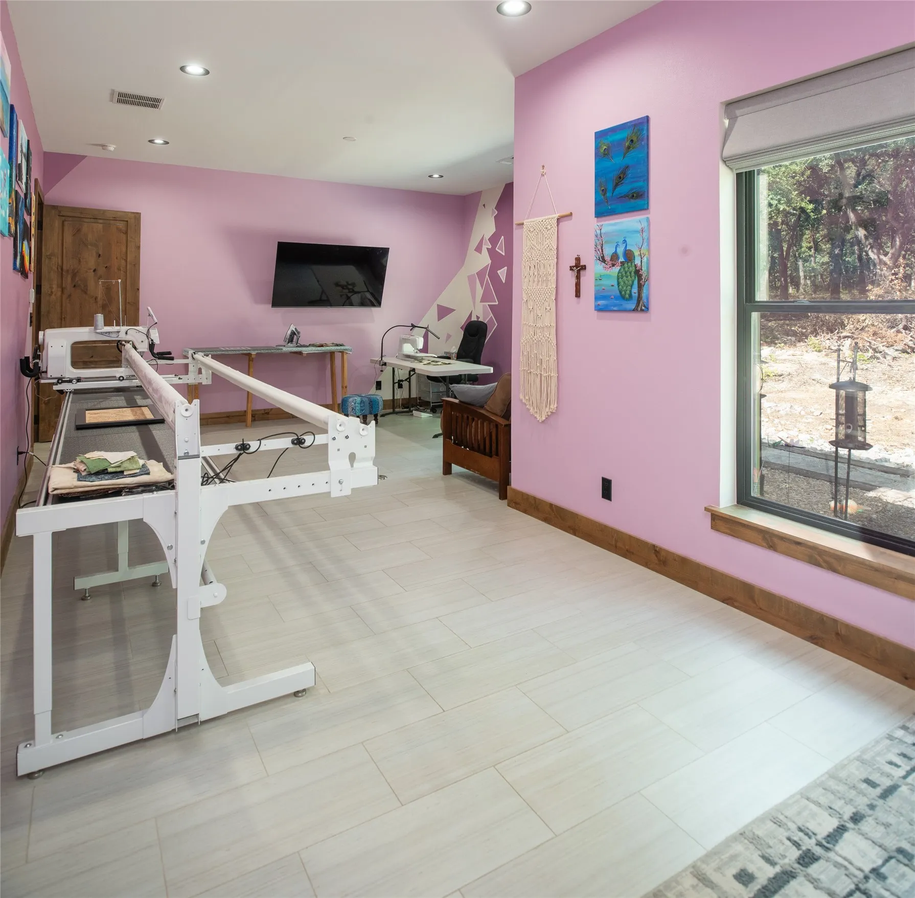 Currently used as a craft room, this space is easily used as a 3rd bedroom