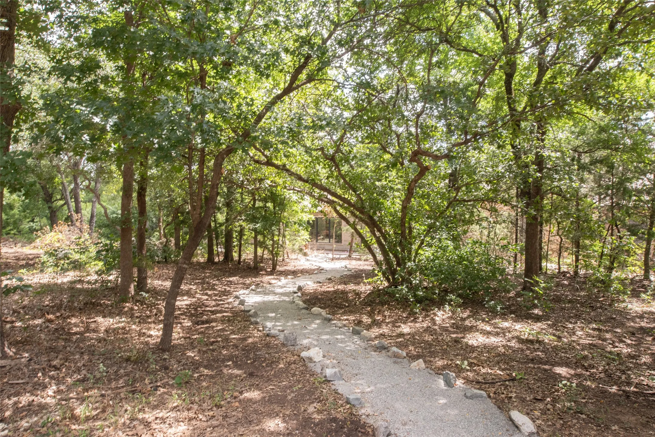Walk through the trees to get to the front door