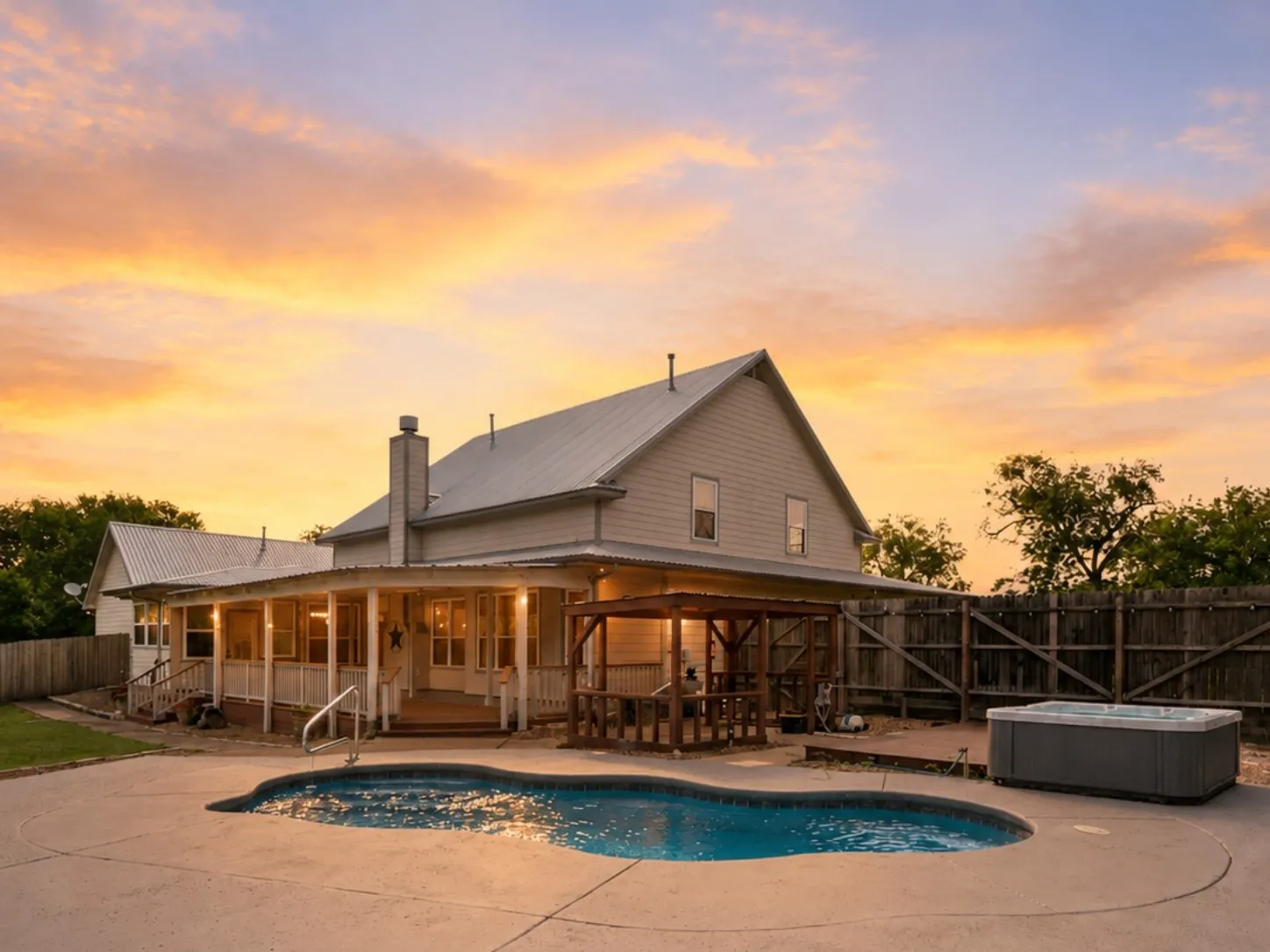 Private backyard retreat with an in-ground swimming pool, spa, covered porch and outdoor entertaining areas.