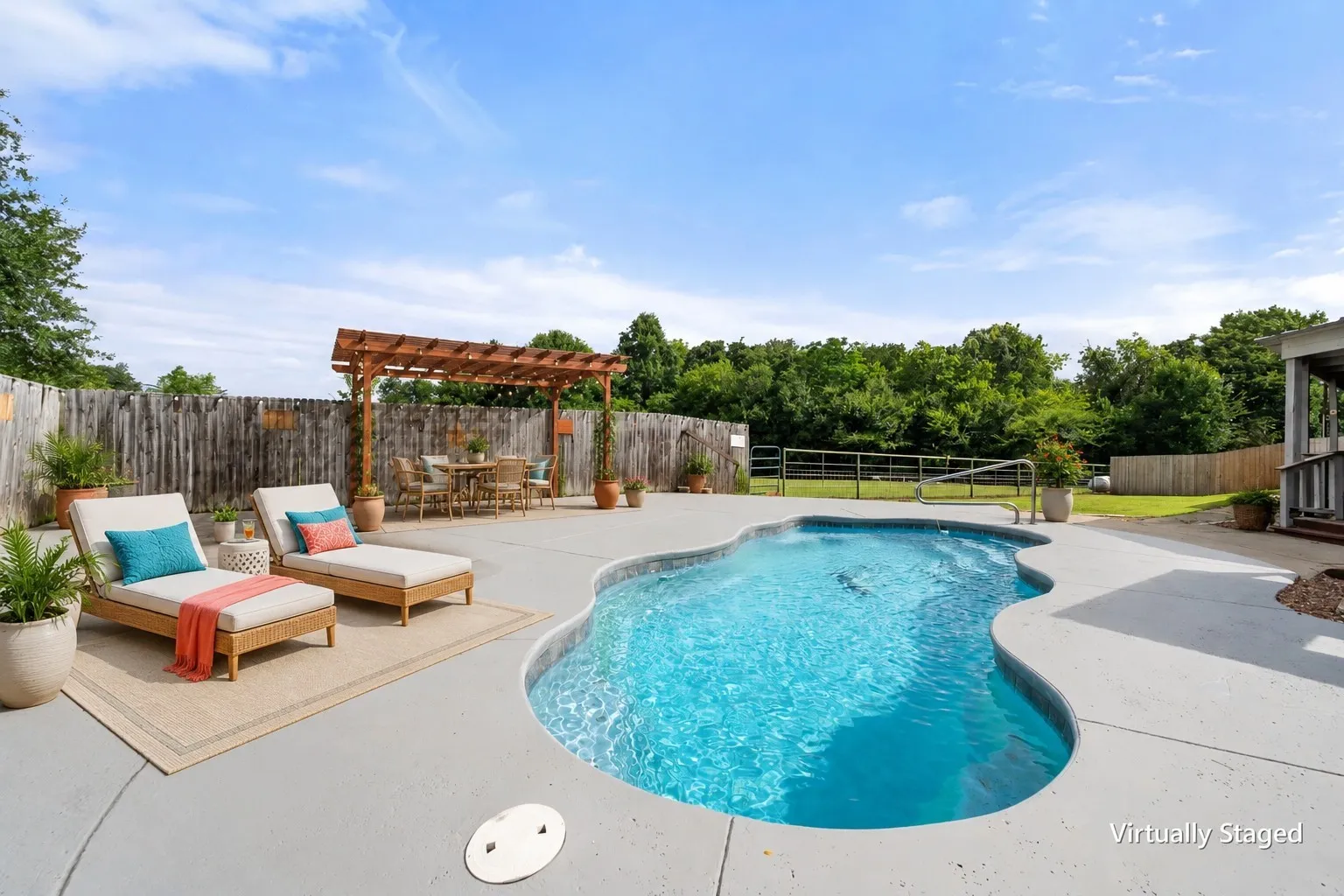 Virtually staged pool deck with lounge chairs, pergola dining area and colorful resort-inspired outdoor accents.