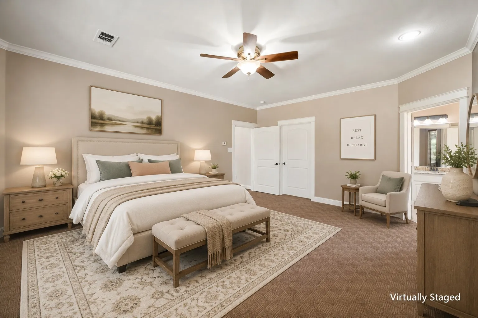 Virtually staged primary suite with modern farmhouse furnishings, layered textiles and a relaxing neutral design.