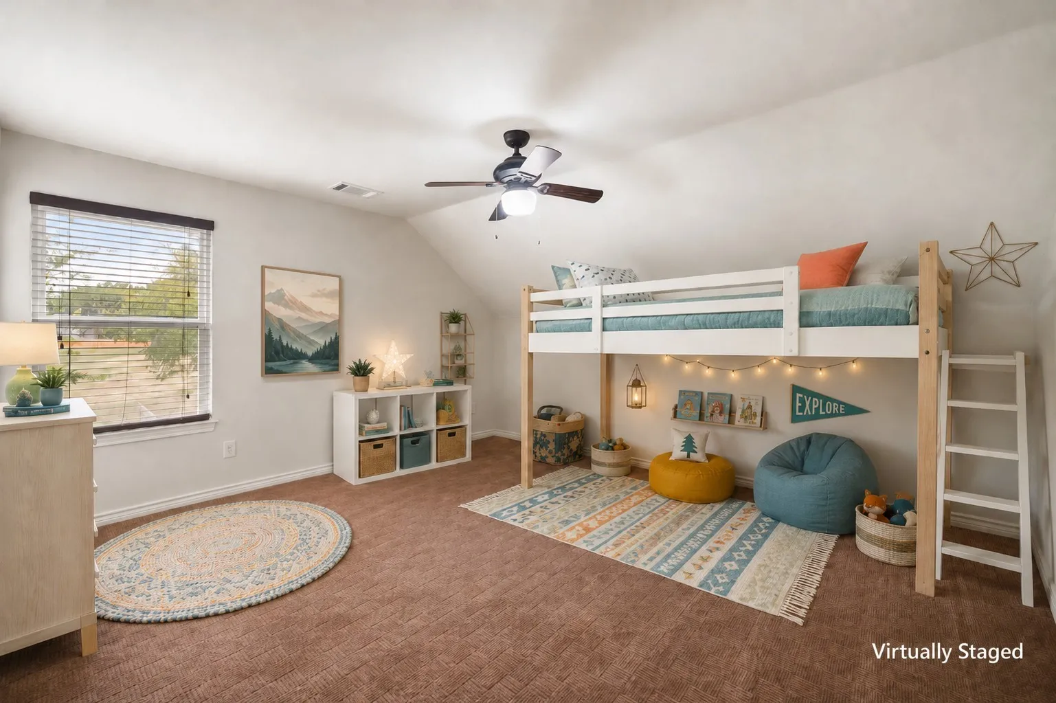 Virtually staged children’s bedroom with loft bed, play area, colorful accents and mountain-inspired décor.