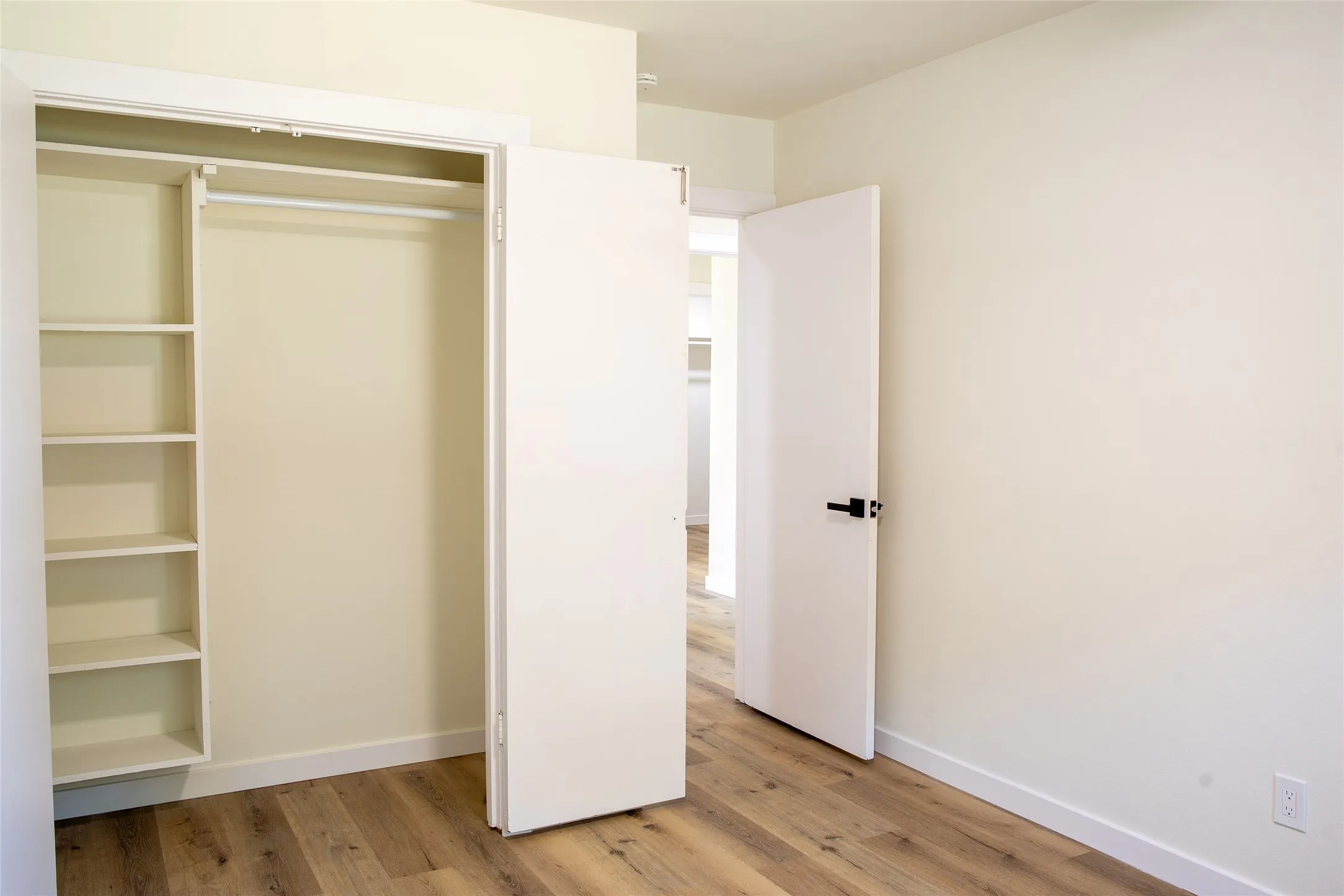 Bedroom 2 Closet- w custom shelving
