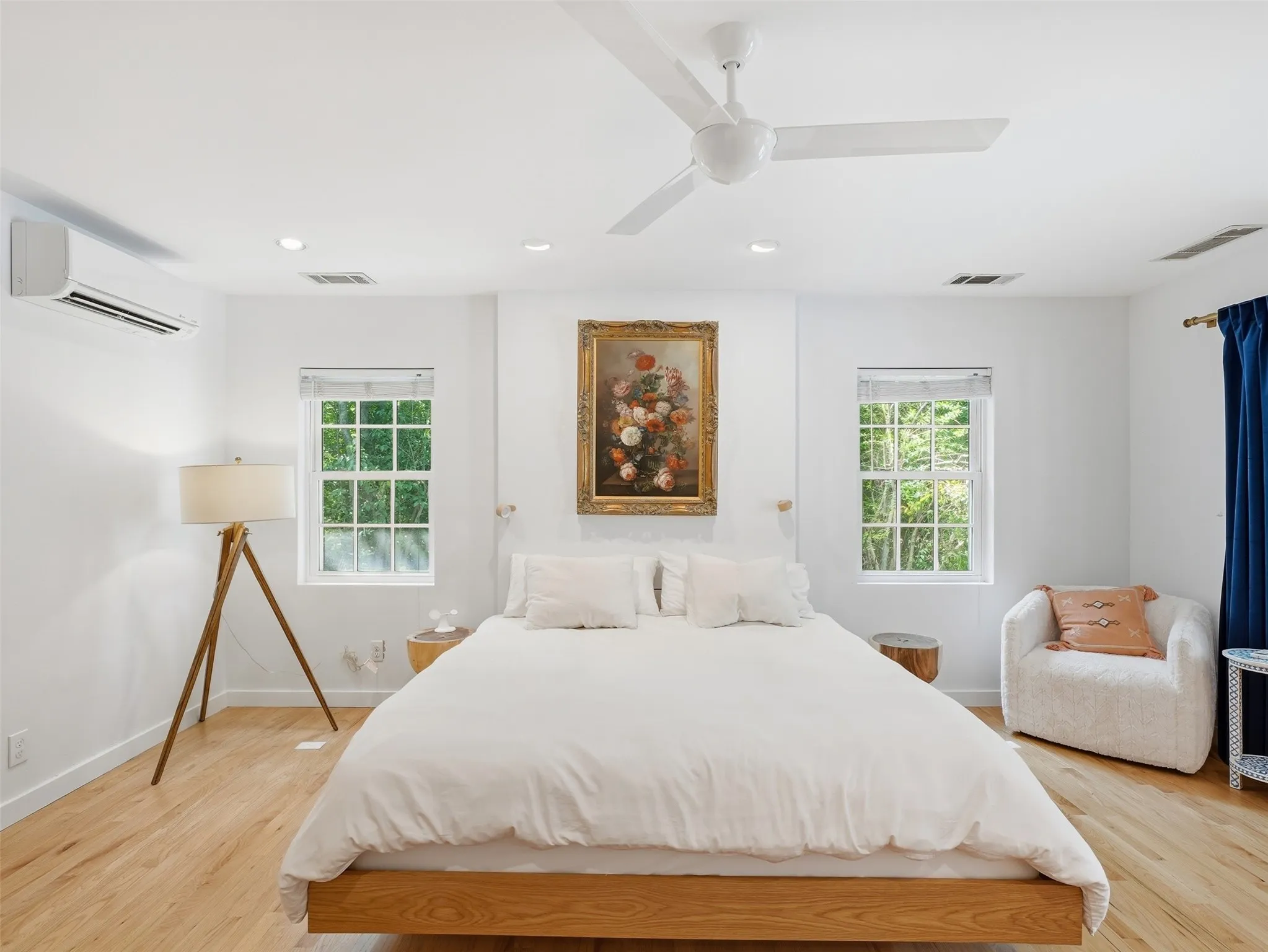 Bedroom featuring light wood-finish flooring, recessed lighting, and a ceiling fan