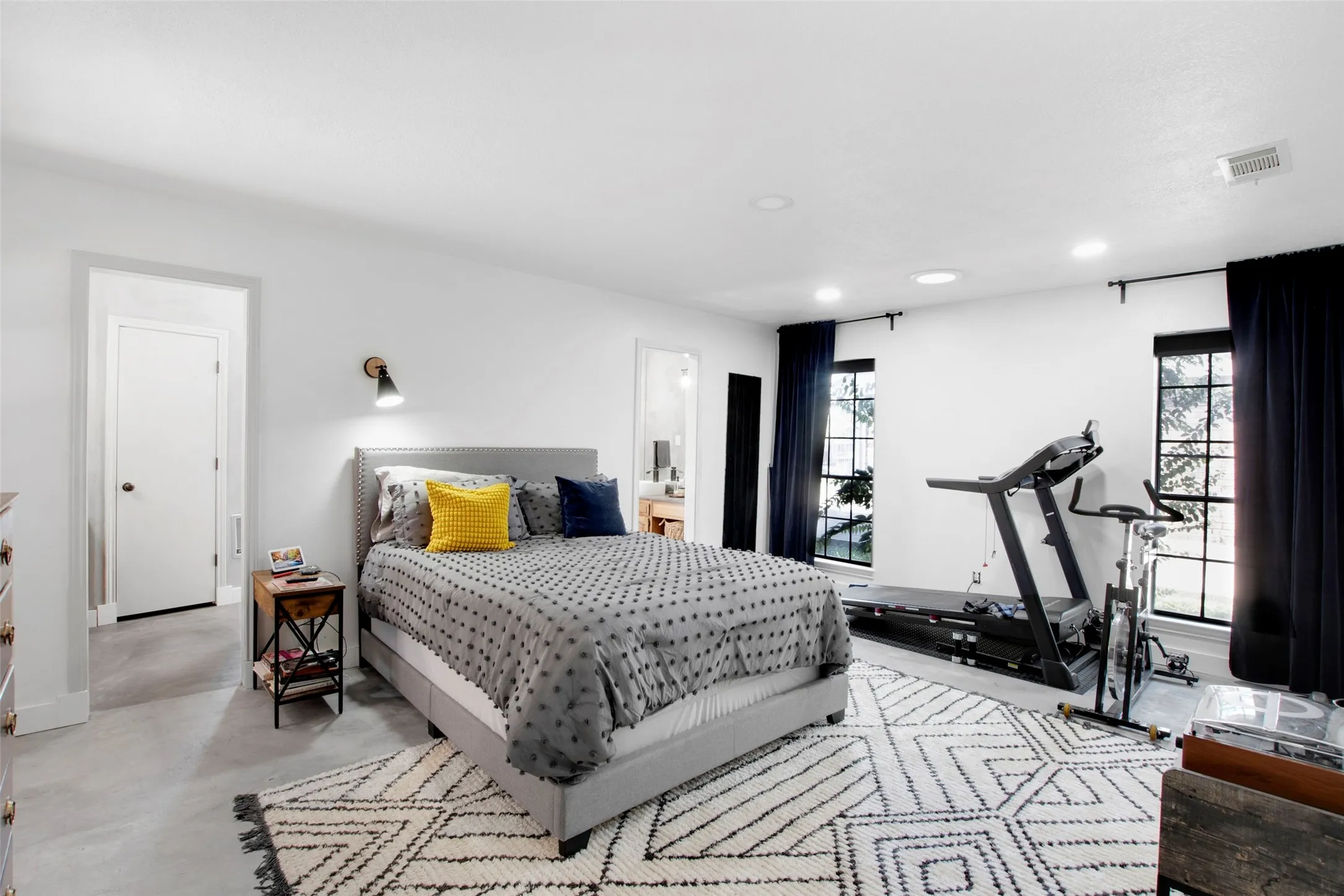 Bedroom featuring multiple windows