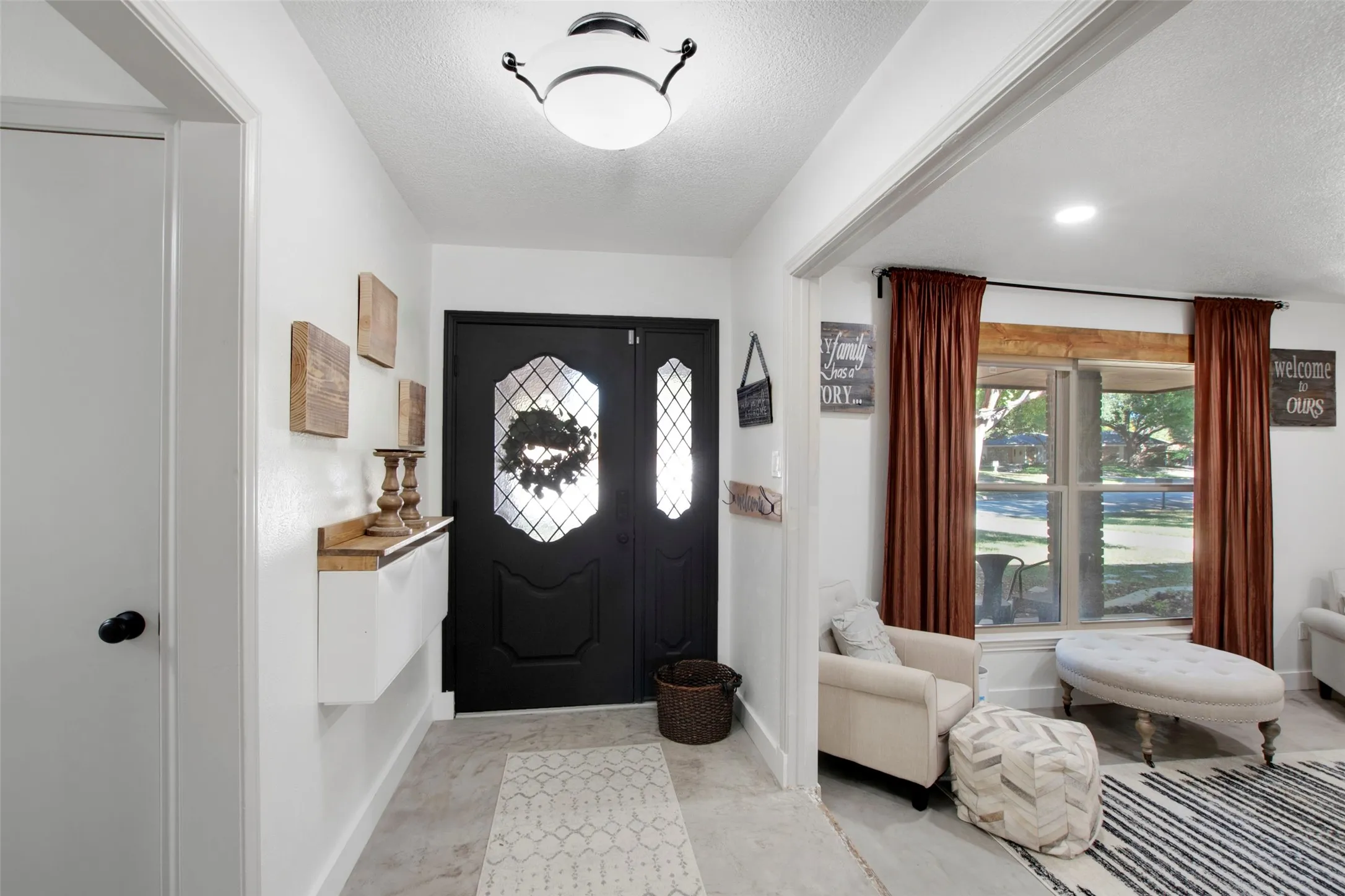 Entrance foyer featuring a textured ceiling