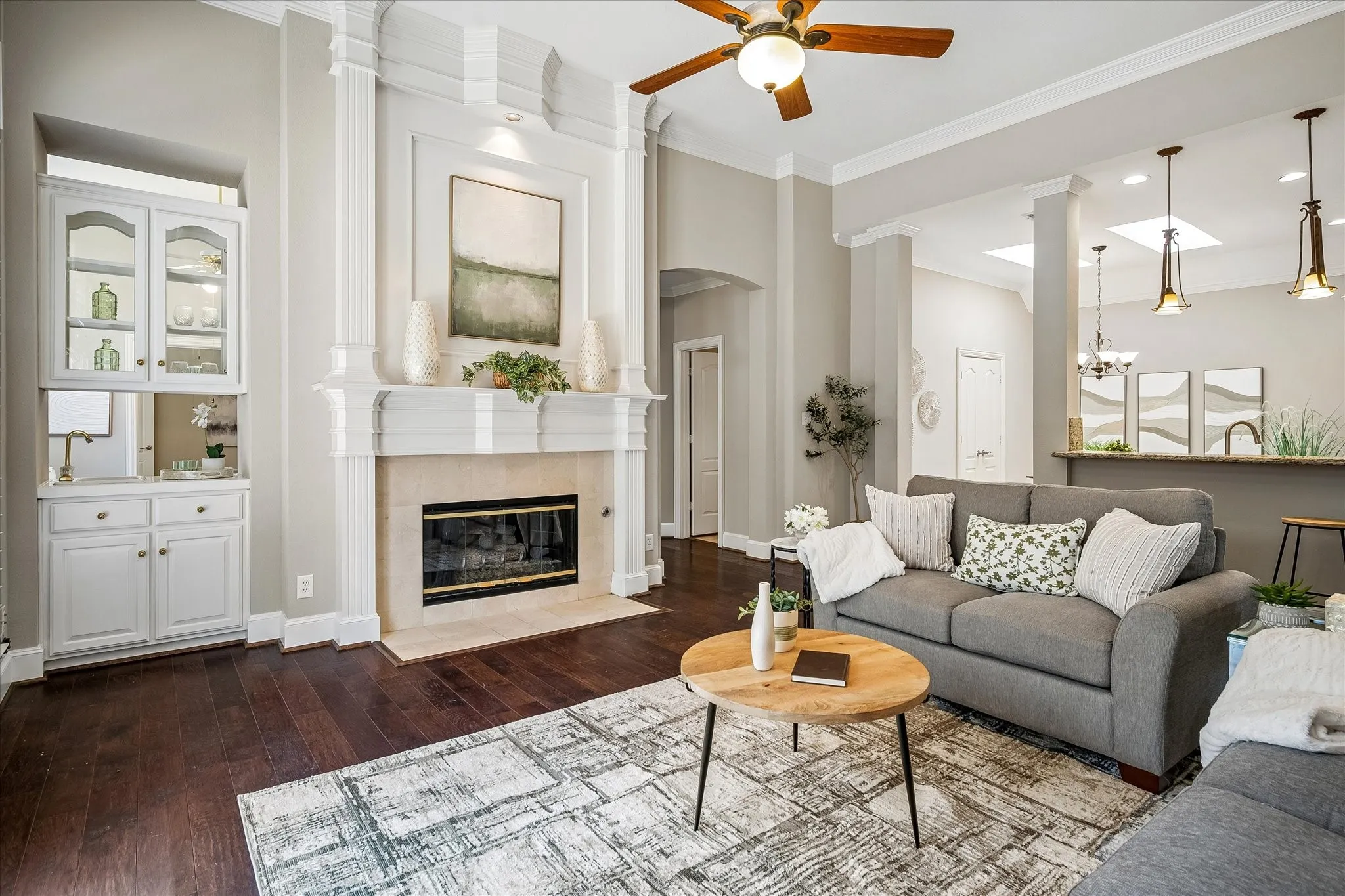 Family Room with wet bar "see-through" to bonus room off primary bedroom.