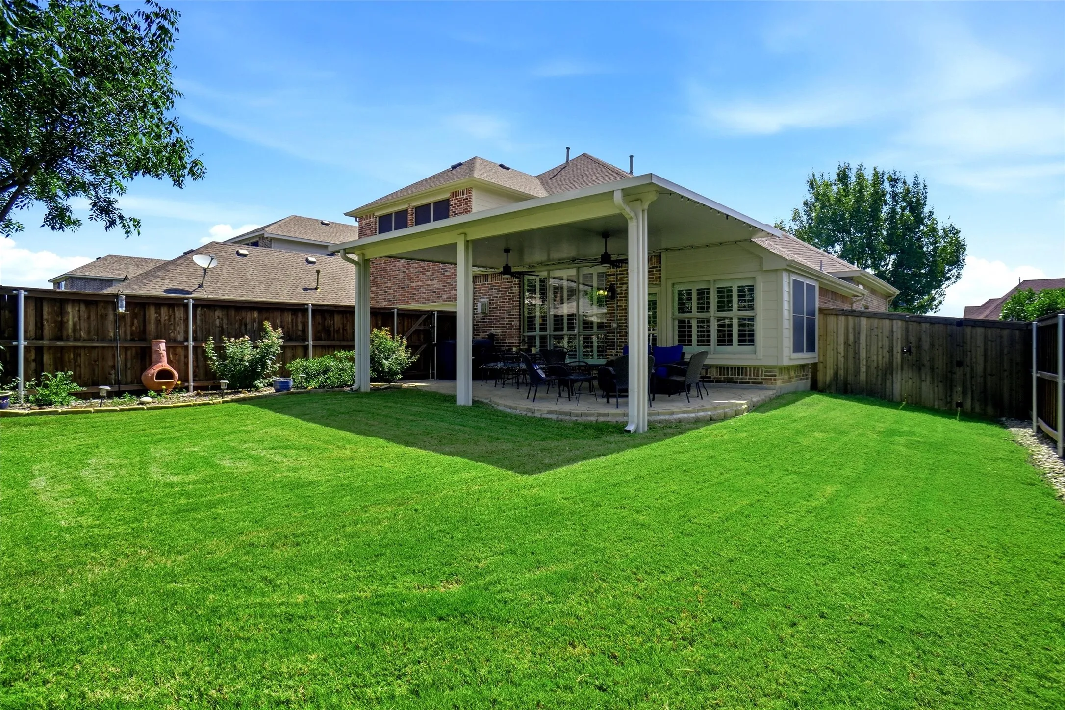 Lovely Grass and Landscaped Backyard
