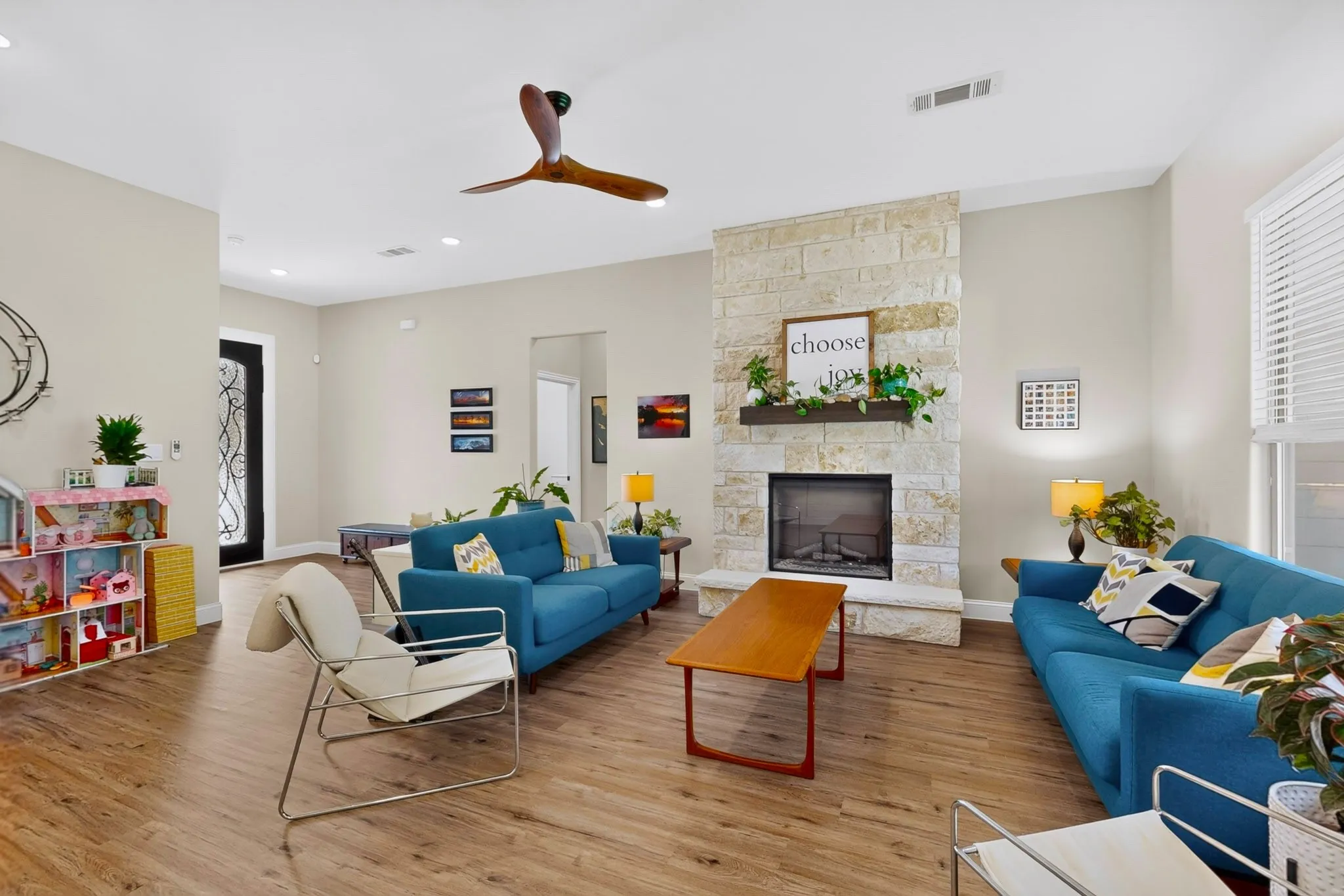 Grand living space, open to layout and invite guests in to enjoy the green views.