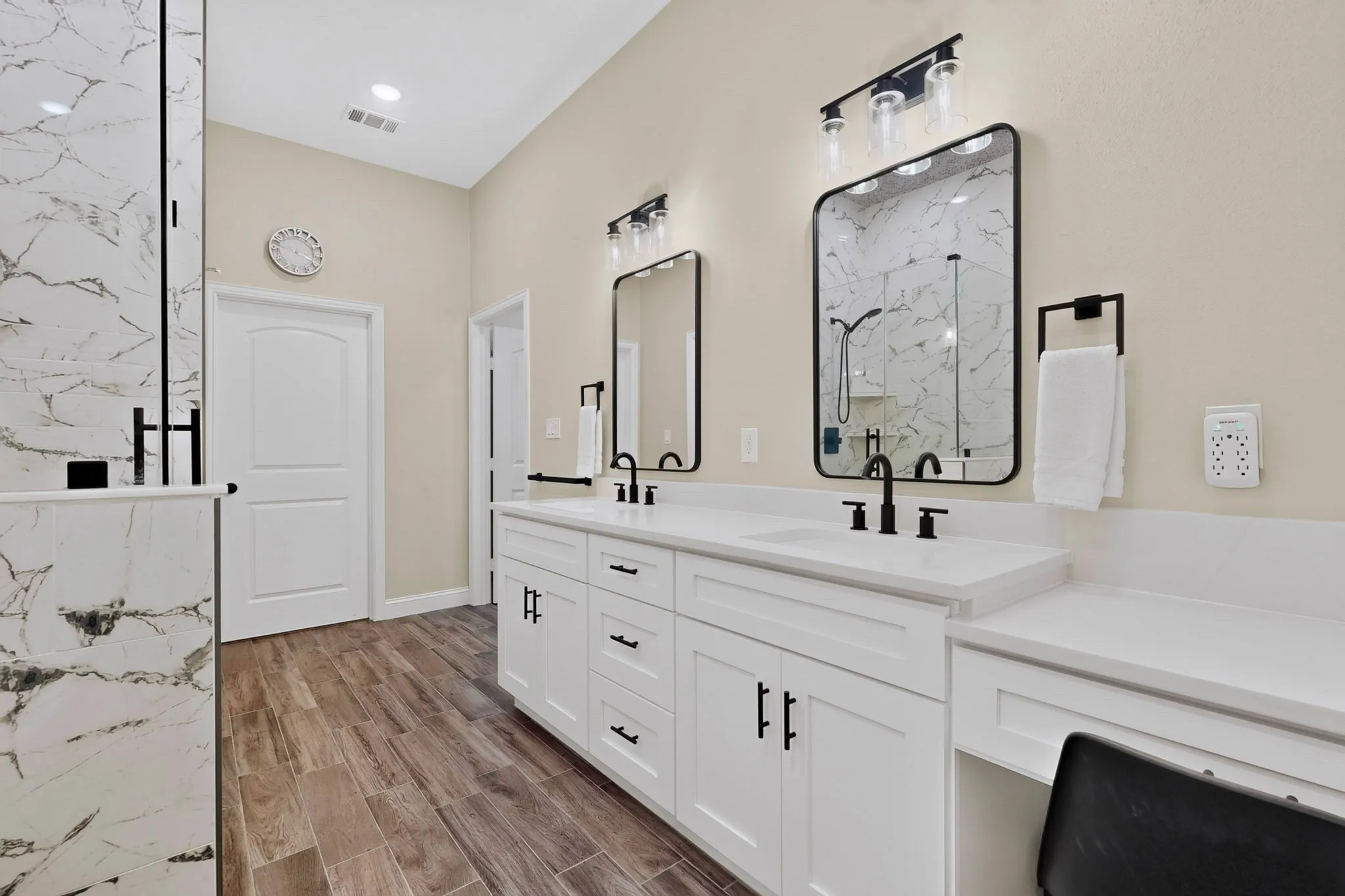 Designed with class, dual sinks, vanity and private water closet.