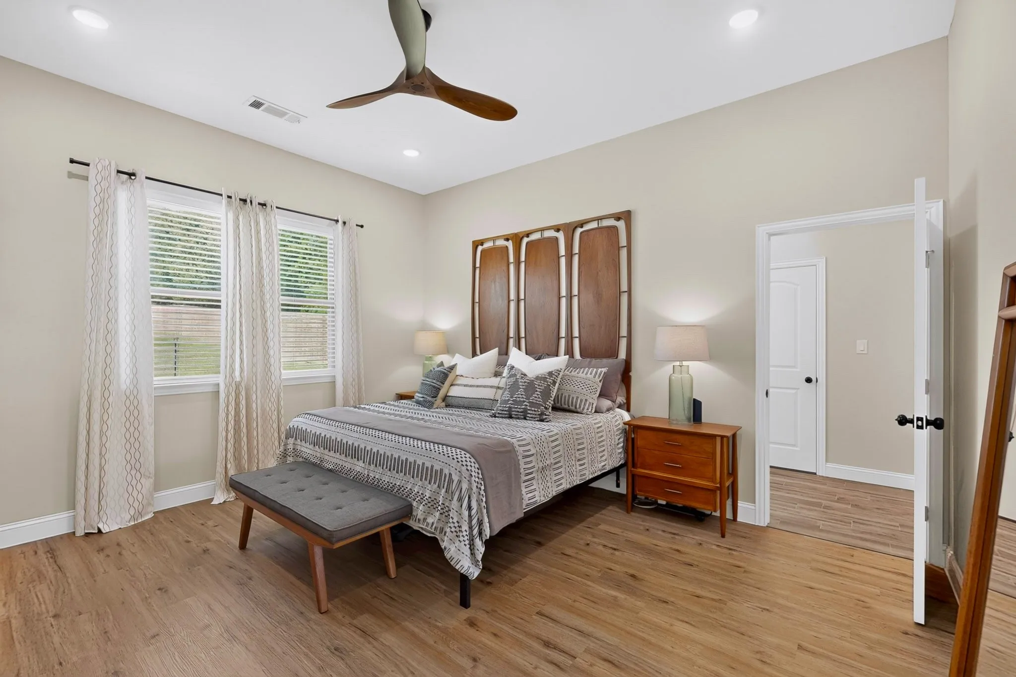 Handsome propeller ceiling fans in every single room.