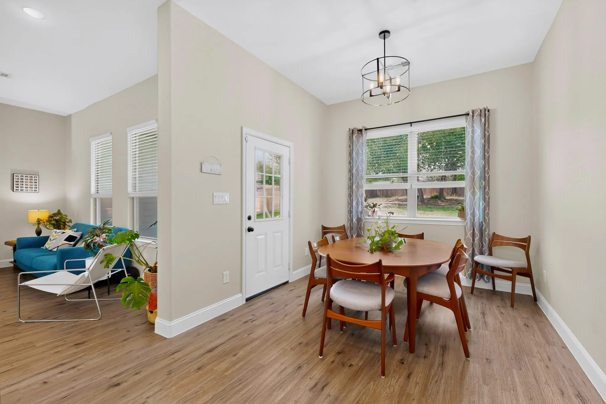 Comfortably seating 6-8 with access to the covered patio when grilling is desired.