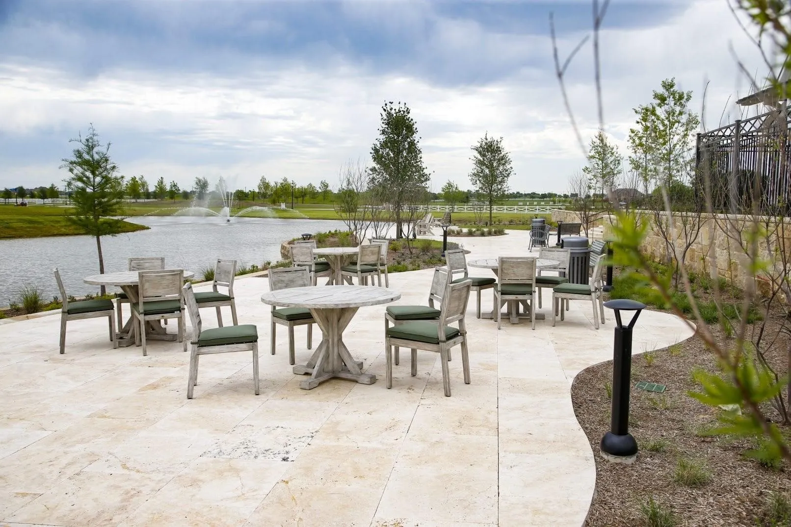 View of patio featuring outdoor dining area and a water view