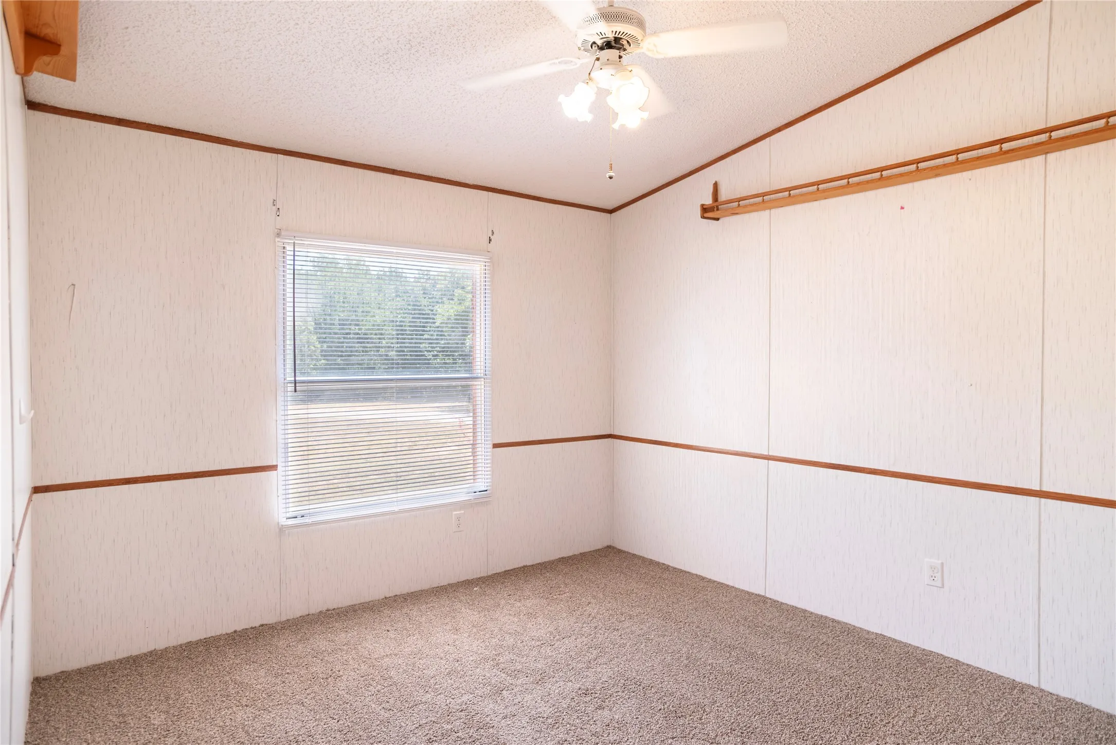 White paneled walls with wood trim details