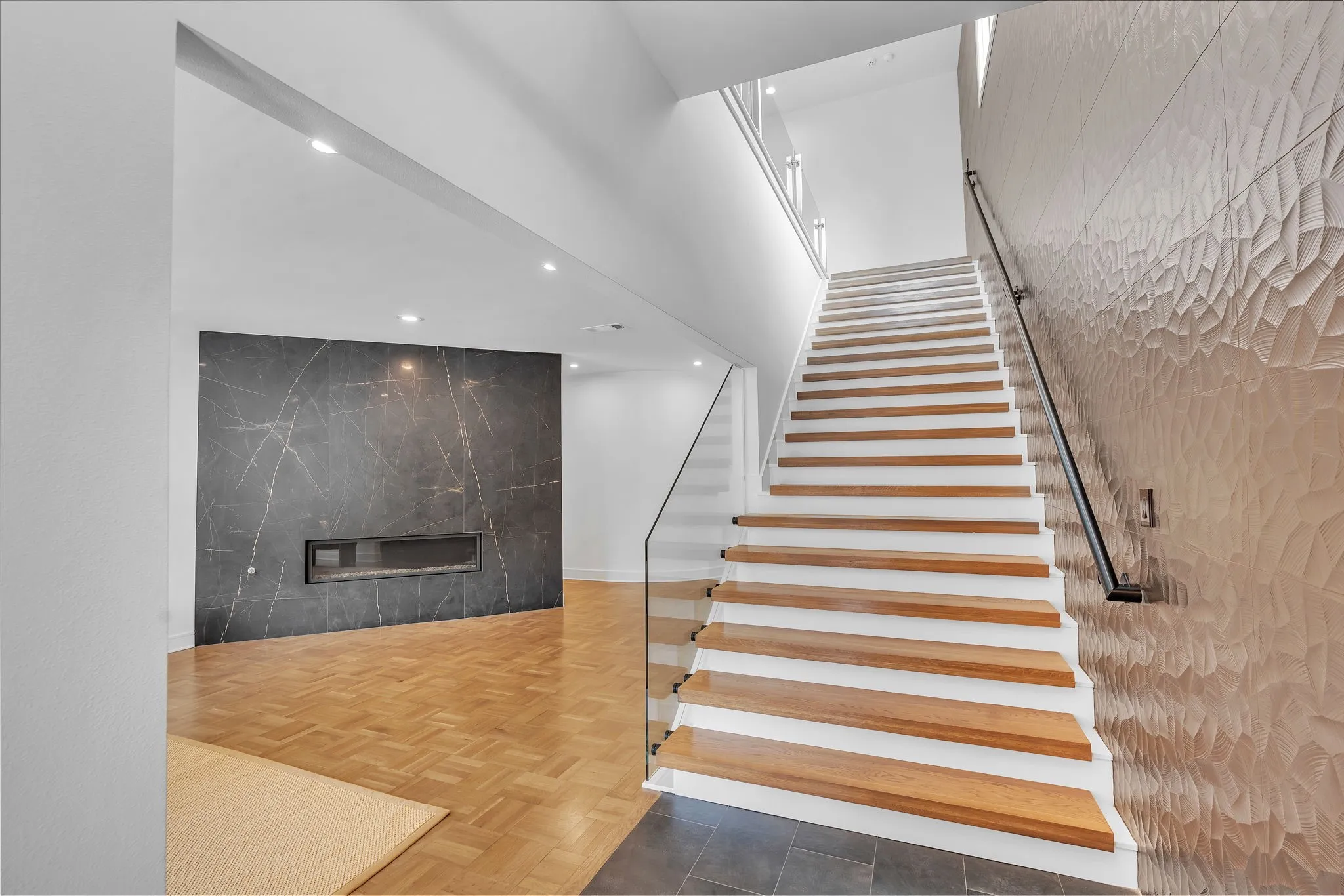 Entry stairs & living room fireplace