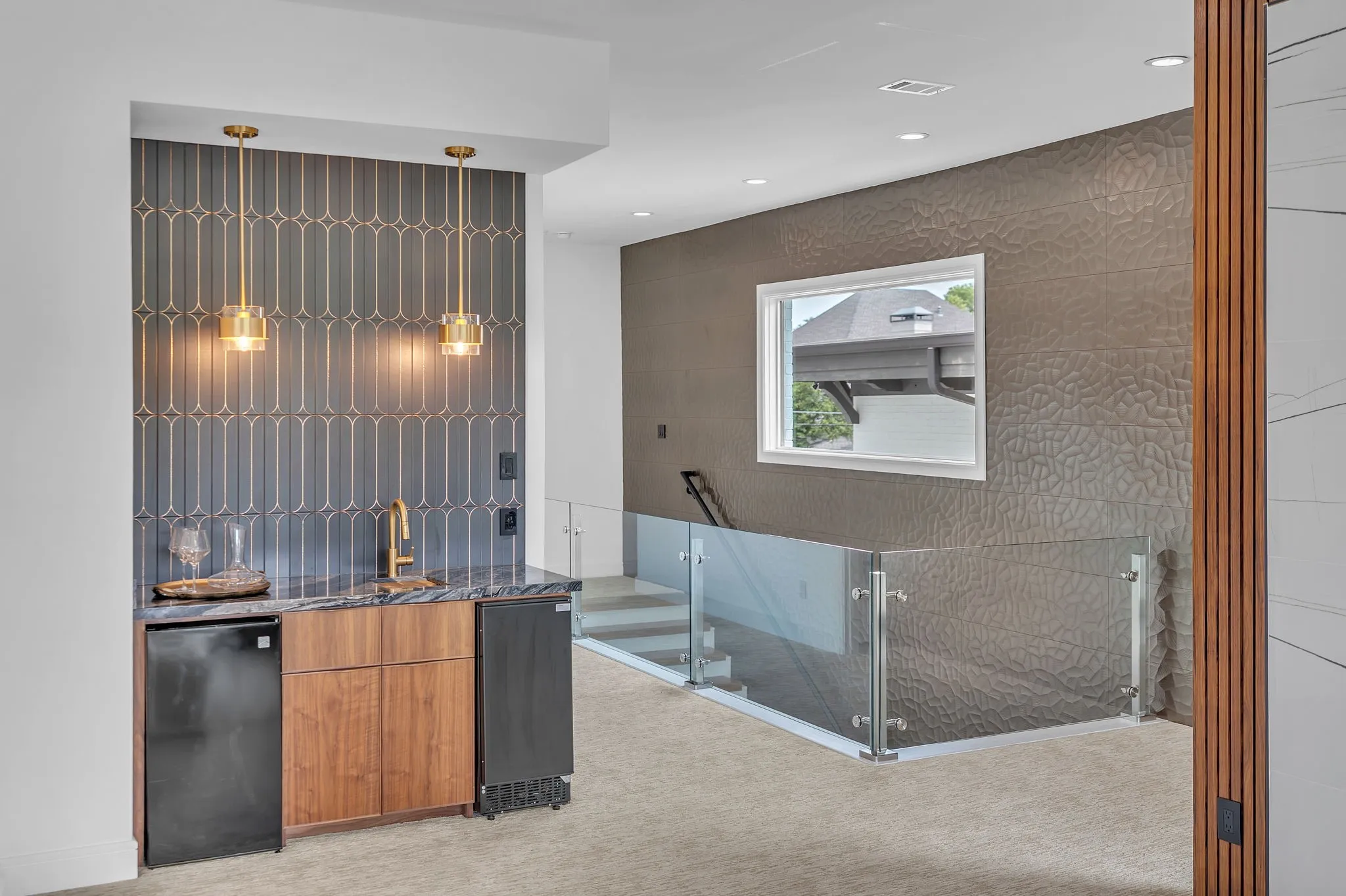 Upstairs wet bar and stairwell