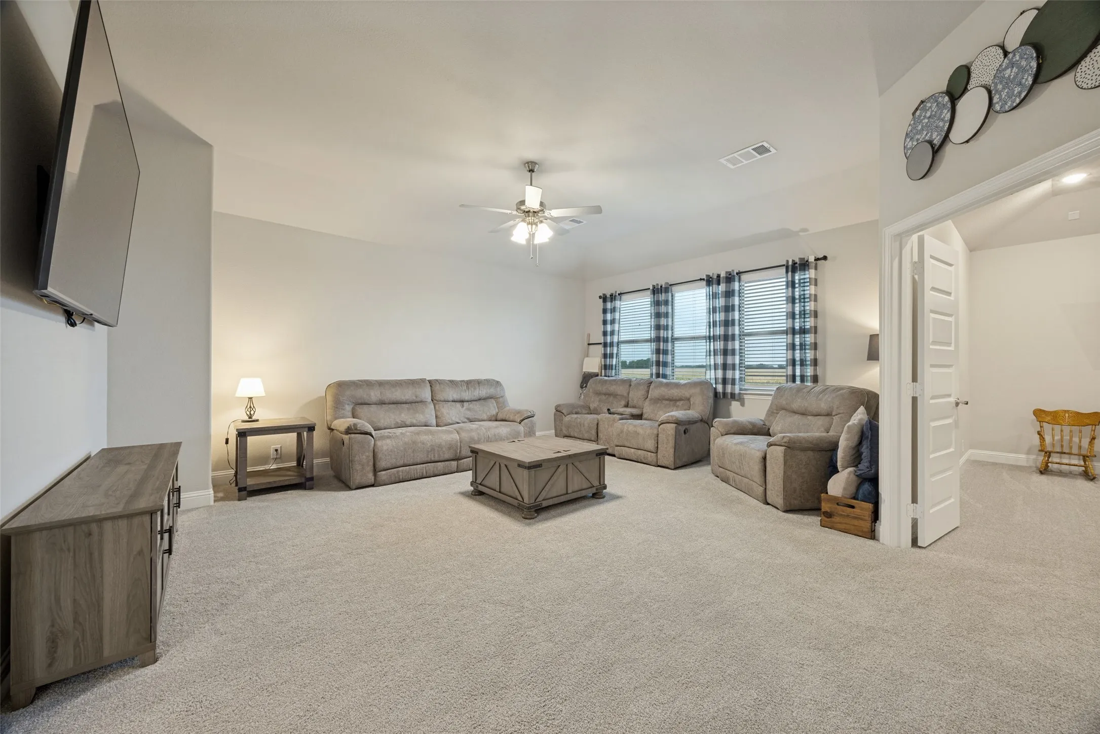 Upstairs family room opens to media room