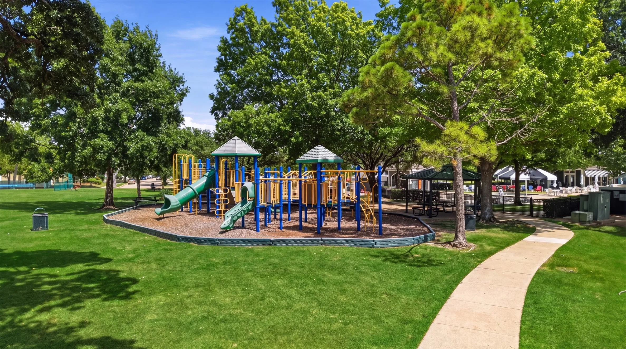 Enjoy access to a beautifully maintained community park featuring a playground for outdoor recreation and family fun.
