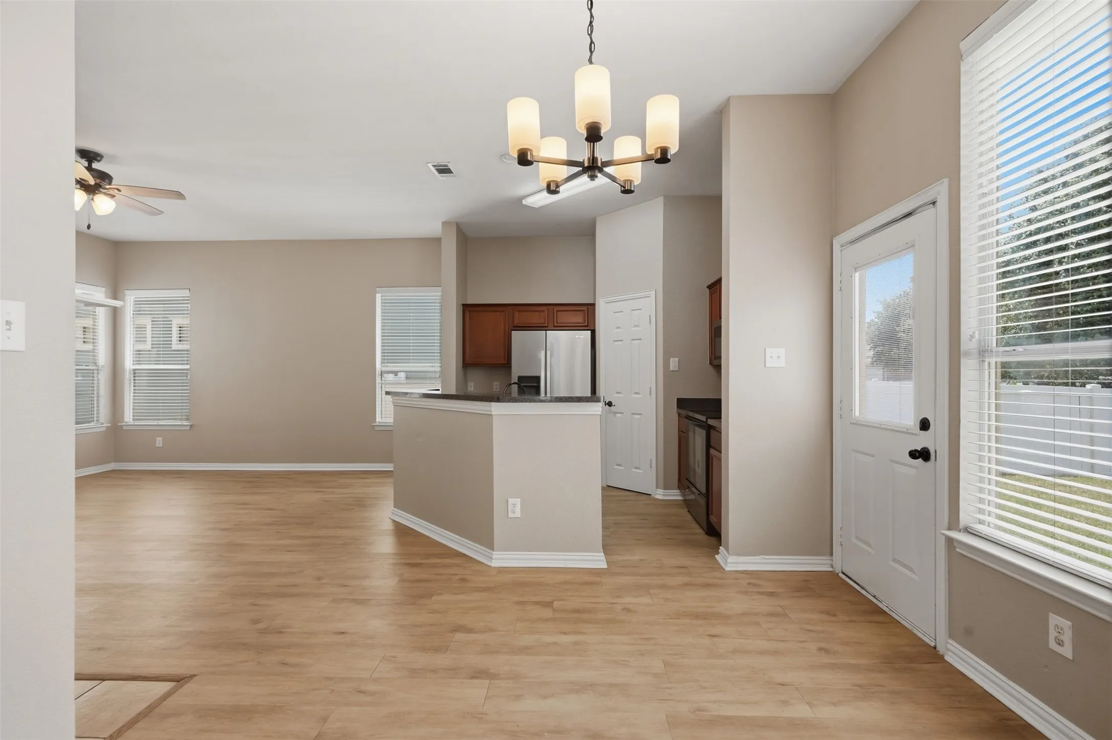 Spacious dining area seamlessly connects to the kitchen and living room, creating an ideal space for entertaining.